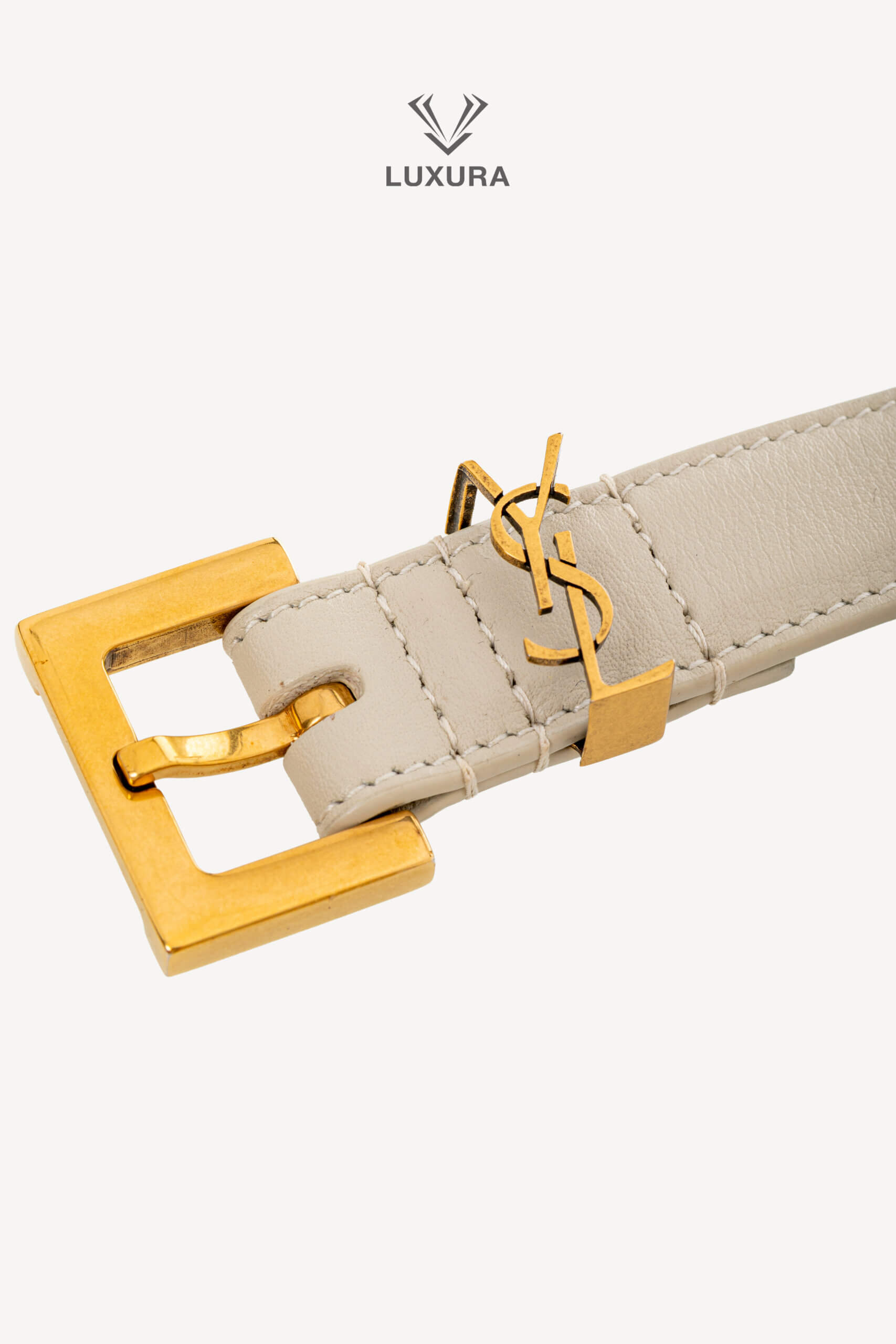 <span style="font-size: 10px;letter-spacing: .15em">BEST DEAL</span><br>            <strong>SAINT LAURENT</strong><br>            <div style="margin-top:10px;font-size:16px">Cassandre Thin `Belt in Smooth Leather Crema Soft 75</div><br> - Image 6