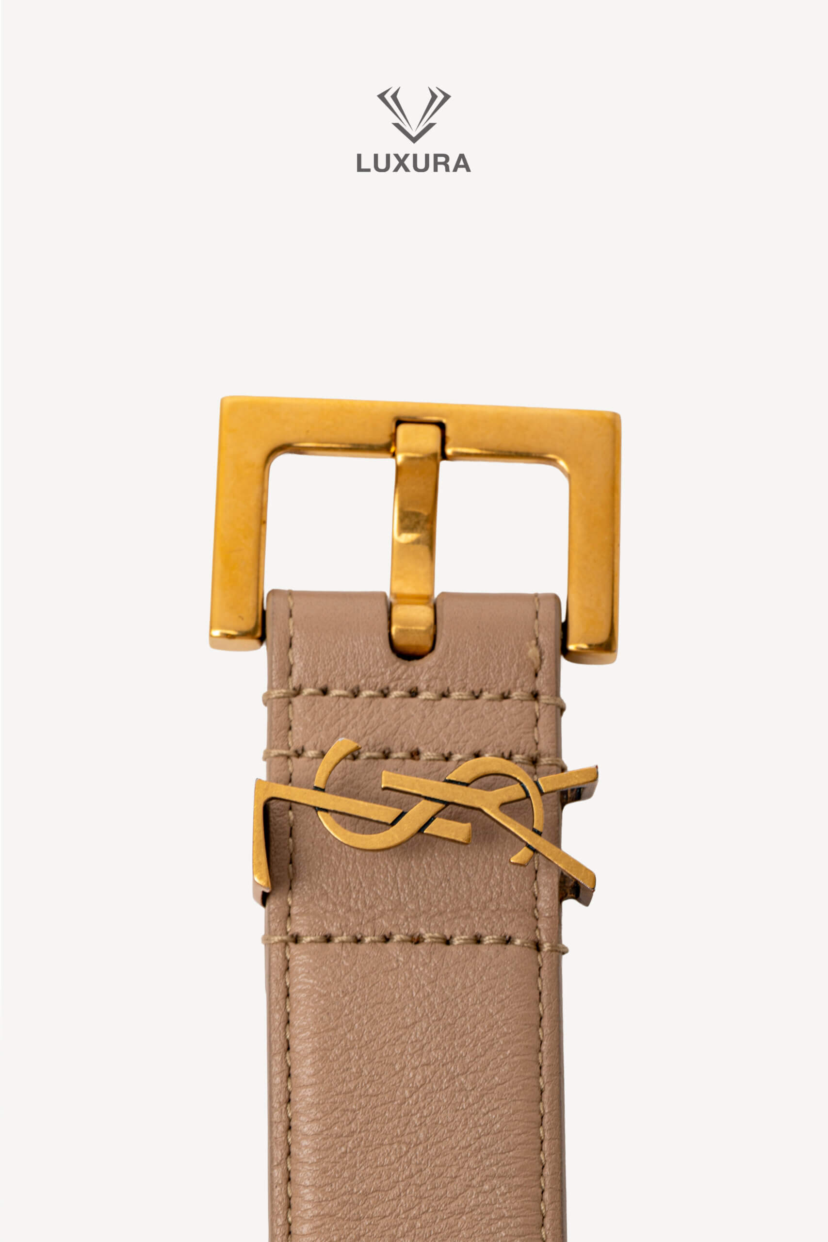 <span style="font-size: 10px;letter-spacing: .15em">BEST DEAL</span><br>            <strong>SAINT LAURENT</strong><br>            <div style="margin-top:10px;font-size:16px">Cassandre Belt in Shiny Leather Beige 75</div><br> - Image 7