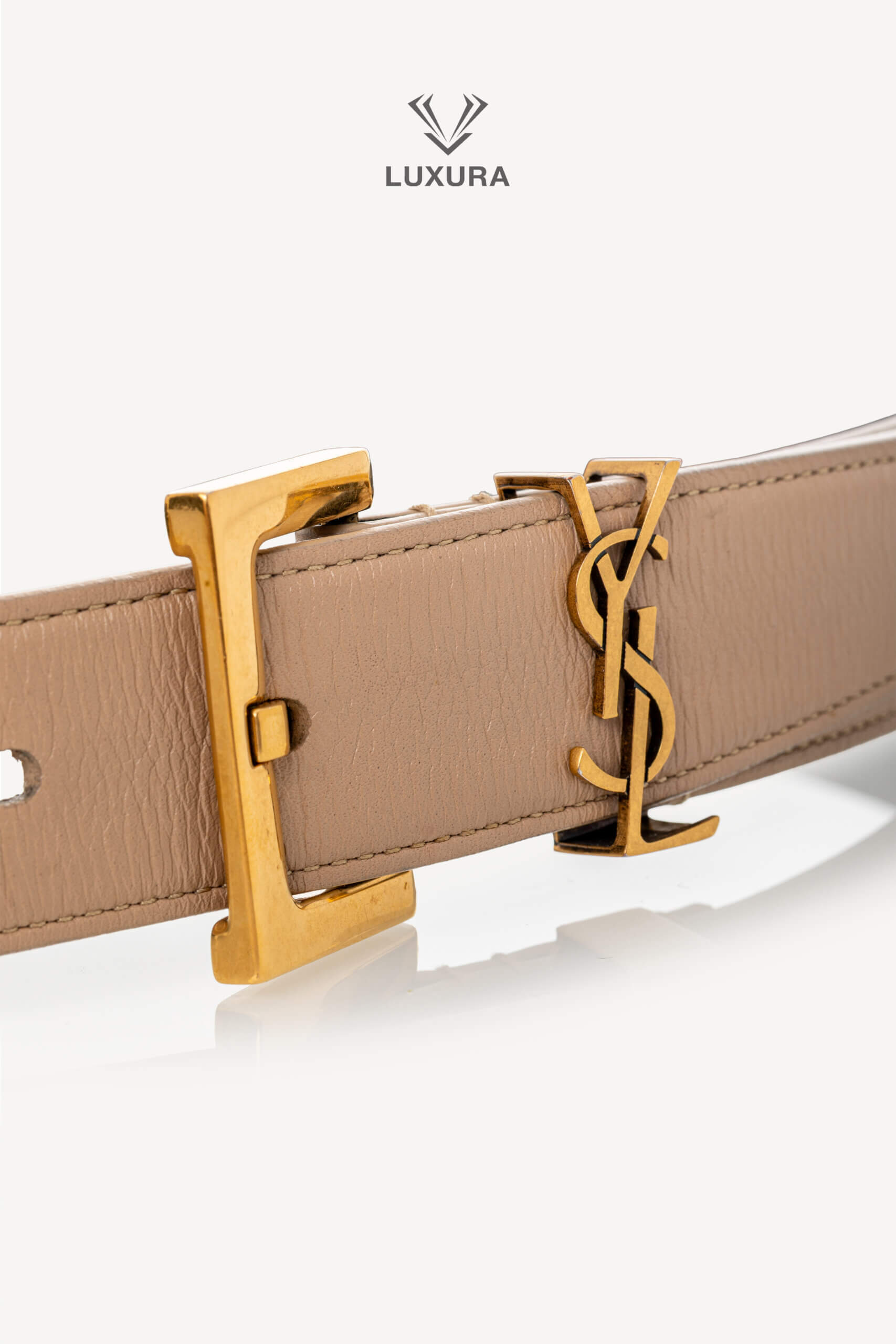 <span style="font-size: 10px;letter-spacing: .15em">BEST DEAL</span><br>            <strong>SAINT LAURENT</strong><br>            <div style="margin-top:10px;font-size:16px">Cassandre Belt in Shiny Leather Beige 75</div><br> - Image 4