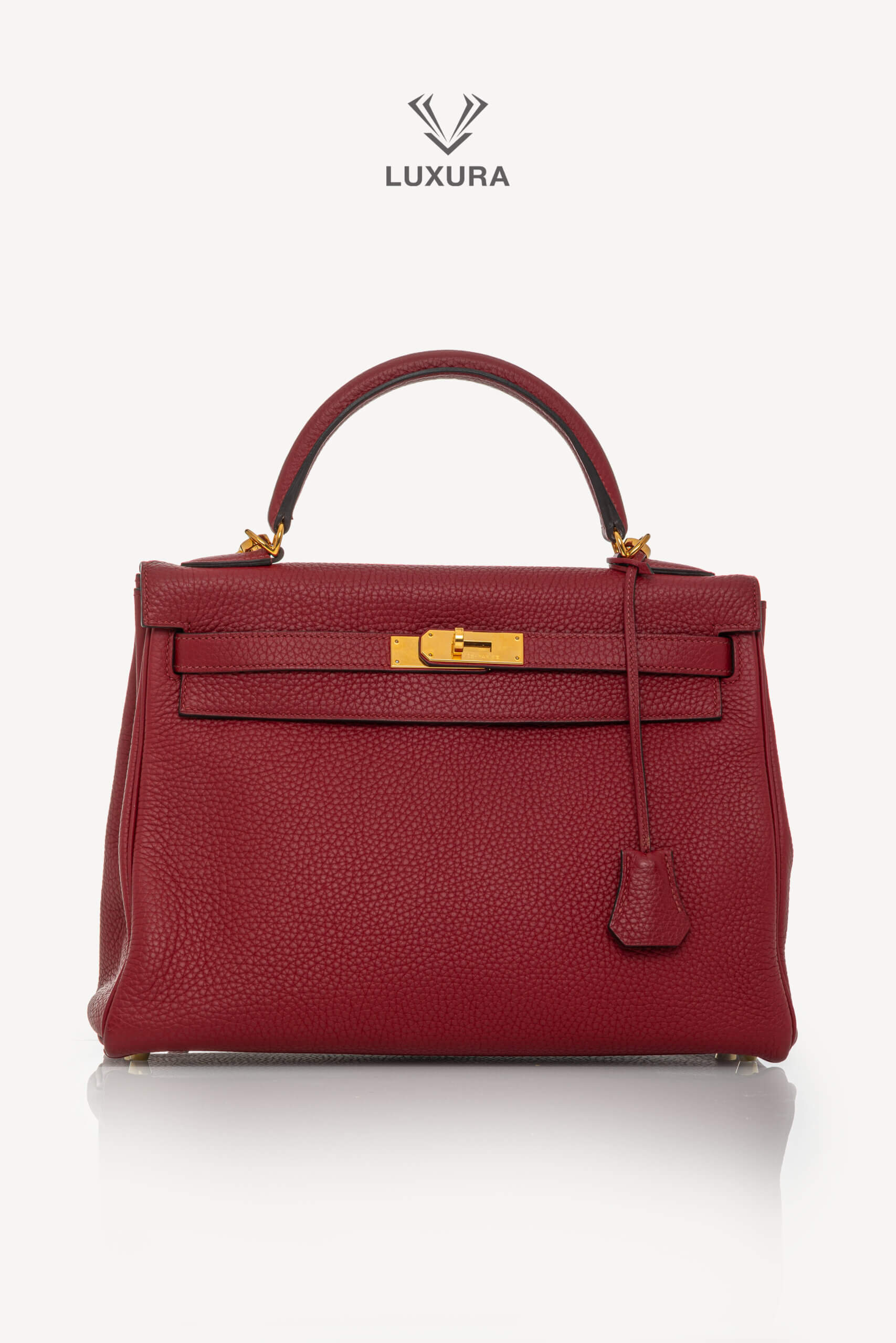 <span style="font-size: 10px;letter-spacing: .15em">HARD TO FIND</span><br>            <strong>HERMES</strong><br>            <div style="margin-top:10px;font-size:16px">Kelly 32 Retourne Togo Rouge Grenat Gold Hardware</div><br> - Image 5