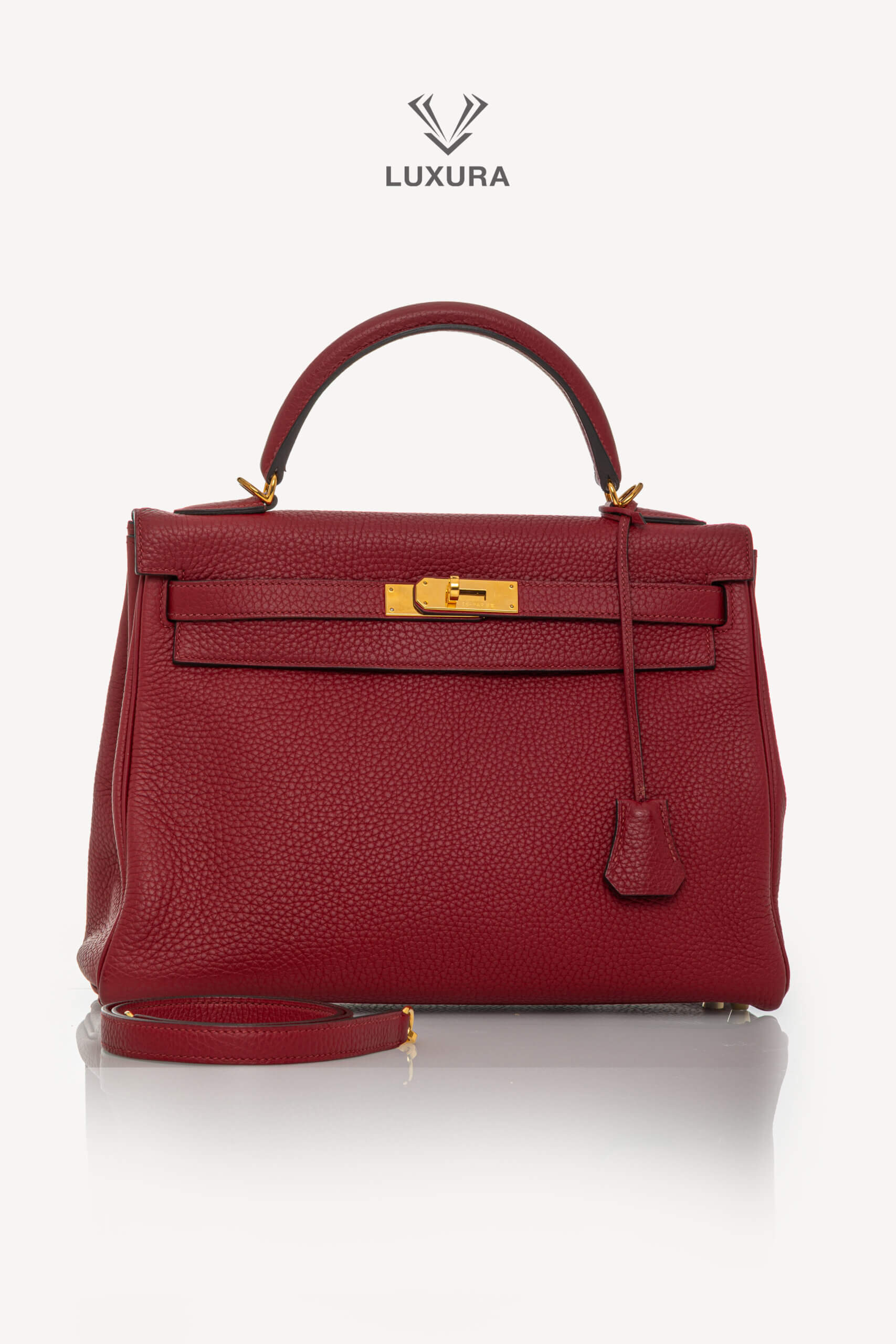 <span style="font-size: 10px;letter-spacing: .15em">HARD TO FIND</span><br>            <strong>HERMES</strong><br>            <div style="margin-top:10px;font-size:16px">Kelly 32 Retourne Togo Rouge Grenat Gold Hardware</div><br> - Image 4