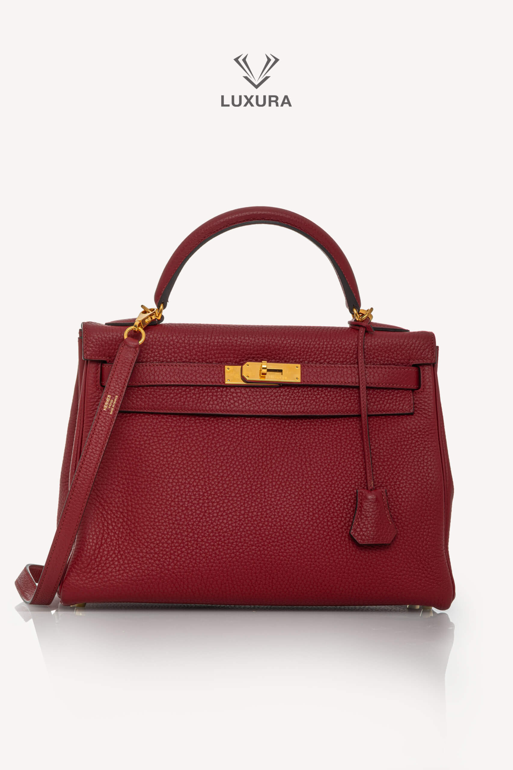 <span style="font-size: 10px;letter-spacing: .15em">HARD TO FIND</span><br>            <strong>HERMES</strong><br>            <div style="margin-top:10px;font-size:16px">Kelly 32 Retourne Togo Rouge Grenat Gold Hardware</div><br>