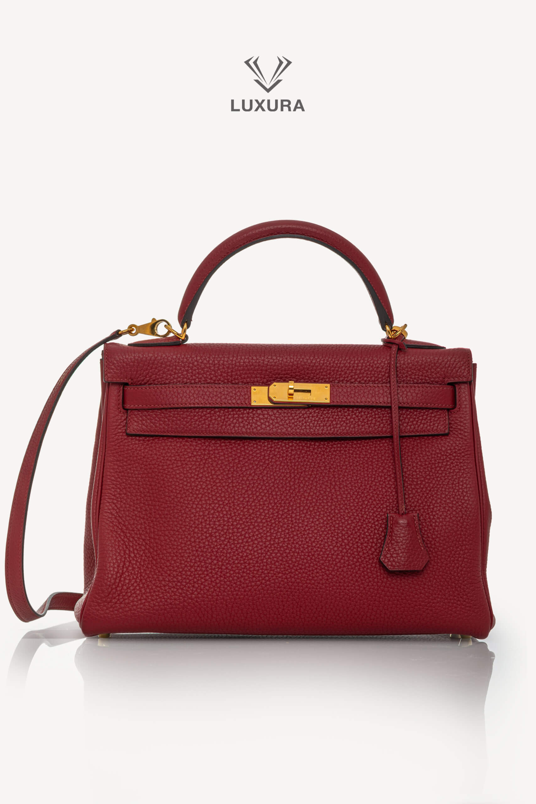 <span style="font-size: 10px;letter-spacing: .15em">HARD TO FIND</span><br>            <strong>HERMES</strong><br>            <div style="margin-top:10px;font-size:16px">Kelly 32 Retourne Togo Rouge Grenat Gold Hardware</div><br> - Image 10