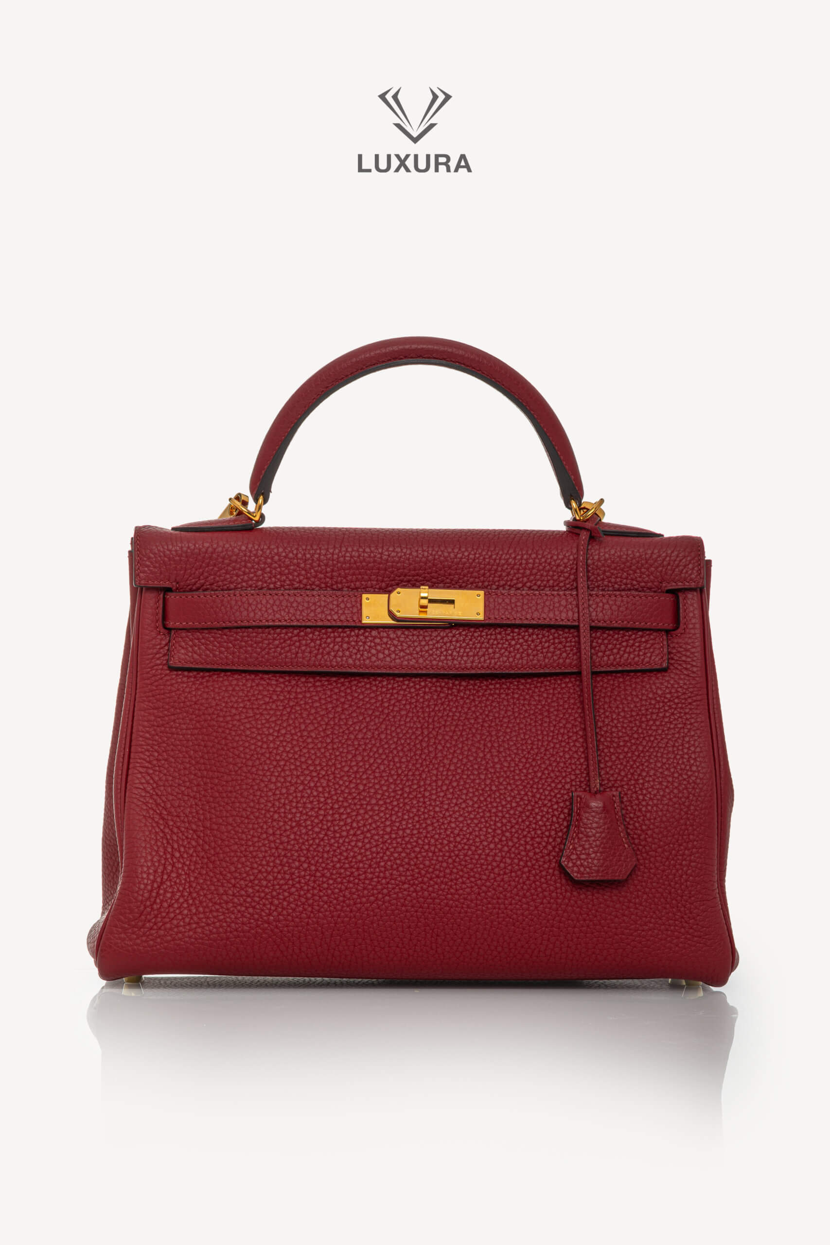 <span style="font-size: 10px;letter-spacing: .15em">HARD TO FIND</span><br>            <strong>HERMES</strong><br>            <div style="margin-top:10px;font-size:16px">Kelly 32 Retourne Togo Rouge Grenat Gold Hardware</div><br> - Image 8