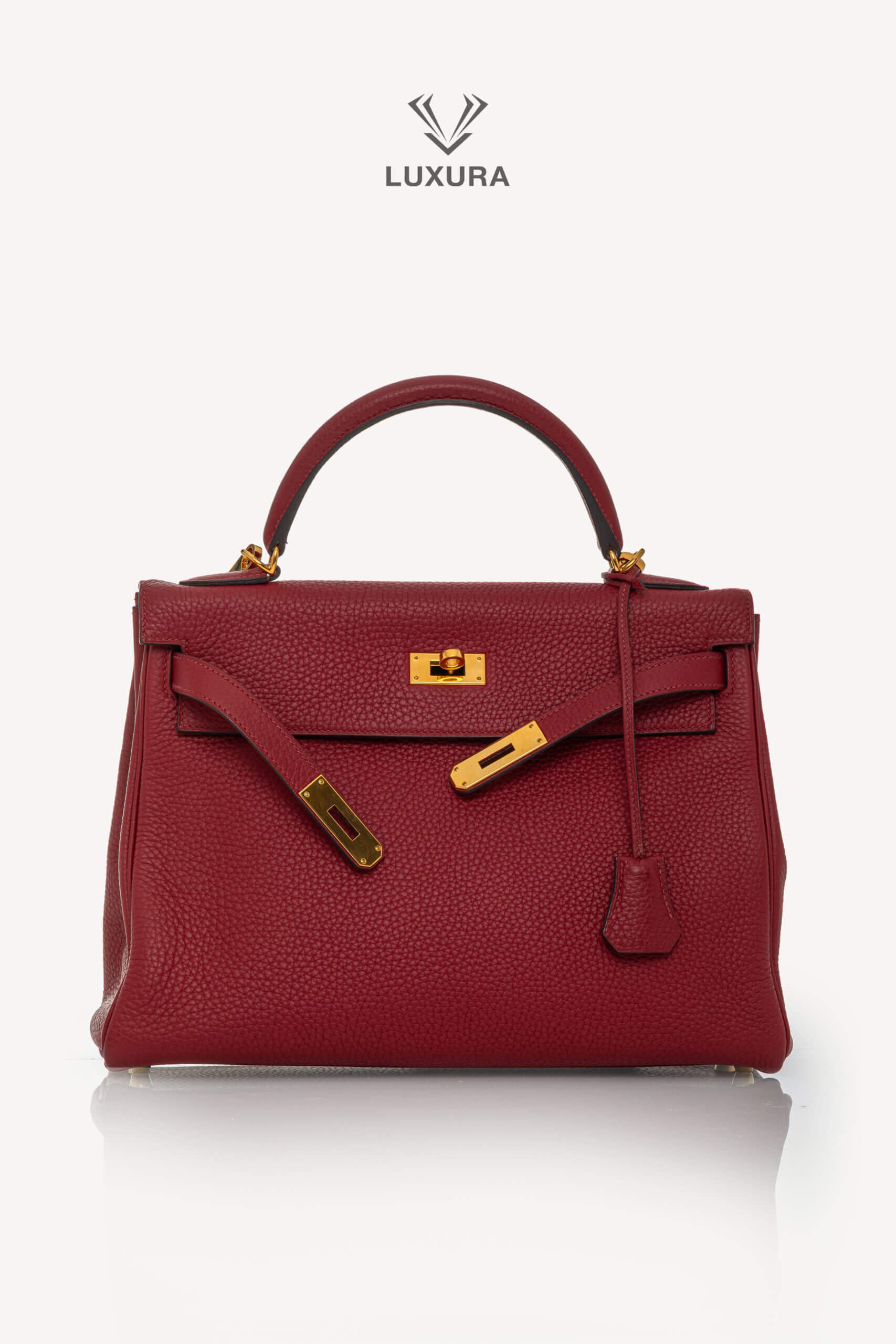 <span style="font-size: 10px;letter-spacing: .15em">HARD TO FIND</span><br>            <strong>HERMES</strong><br>            <div style="margin-top:10px;font-size:16px">Kelly 32 Retourne Togo Rouge Grenat Gold Hardware</div><br> - Image 6