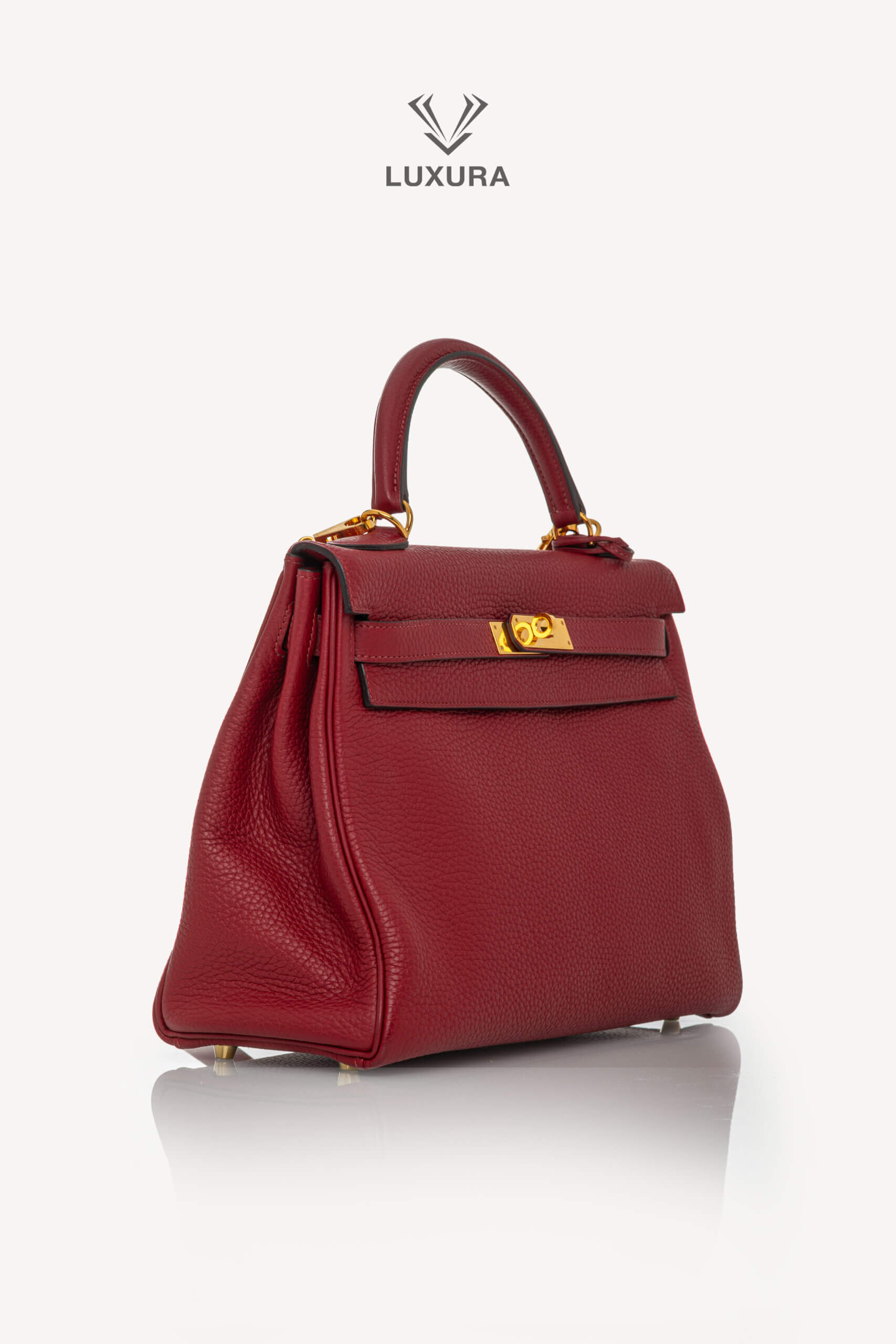 <span style="font-size: 10px;letter-spacing: .15em">HARD TO FIND</span><br>            <strong>HERMES</strong><br>            <div style="margin-top:10px;font-size:16px">Kelly 32 Retourne Togo Rouge Grenat Gold Hardware</div><br> - Image 3