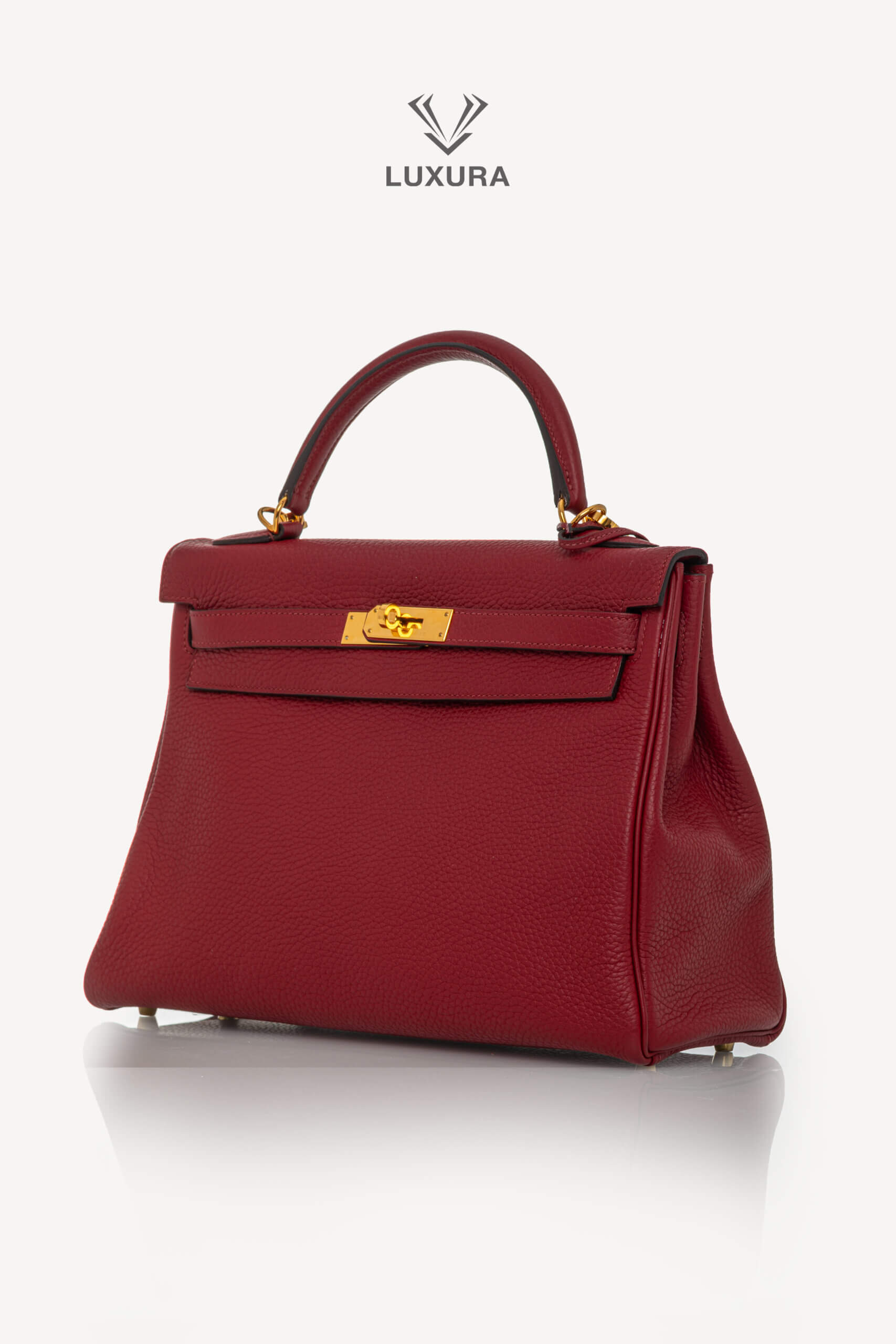 <span style="font-size: 10px;letter-spacing: .15em">HARD TO FIND</span><br>            <strong>HERMES</strong><br>            <div style="margin-top:10px;font-size:16px">Kelly 32 Retourne Togo Rouge Grenat Gold Hardware</div><br> - Image 11