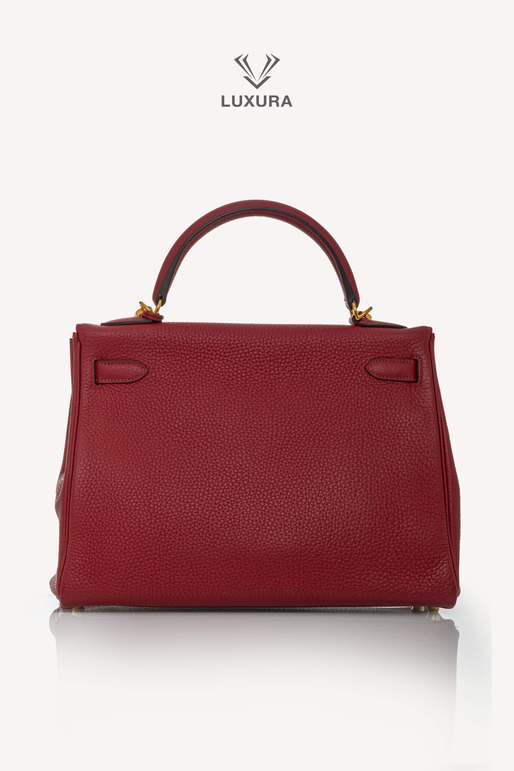 <span style="font-size: 10px;letter-spacing: .15em">HARD TO FIND</span><br>            <strong>HERMES</strong><br>            <div style="margin-top:10px;font-size:16px">Kelly 32 Retourne Togo Rouge Grenat Gold Hardware</div><br> - Image 9