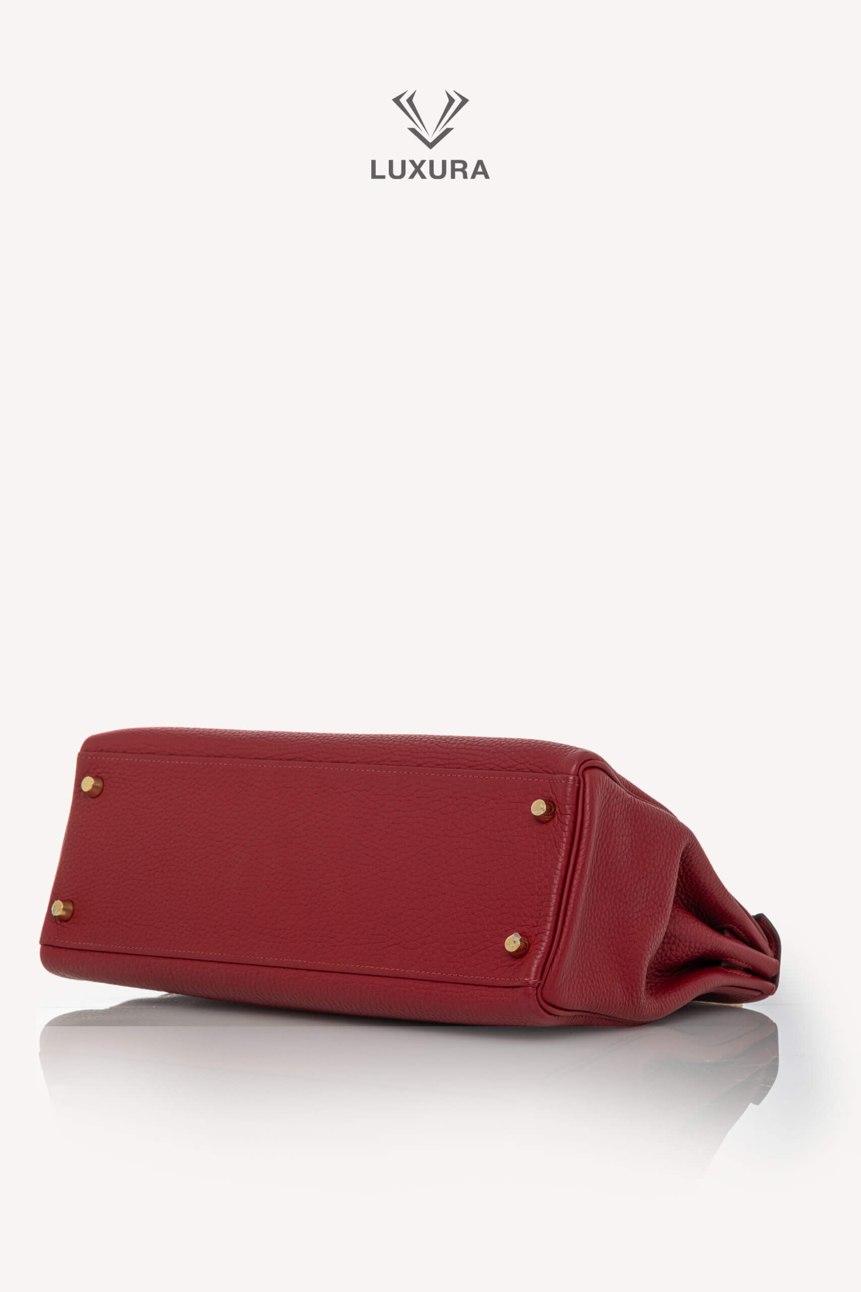 <span style="font-size: 10px;letter-spacing: .15em">HARD TO FIND</span><br>            <strong>HERMES</strong><br>            <div style="margin-top:10px;font-size:16px">Kelly 32 Retourne Togo Rouge Grenat Gold Hardware</div><br> - Image 37