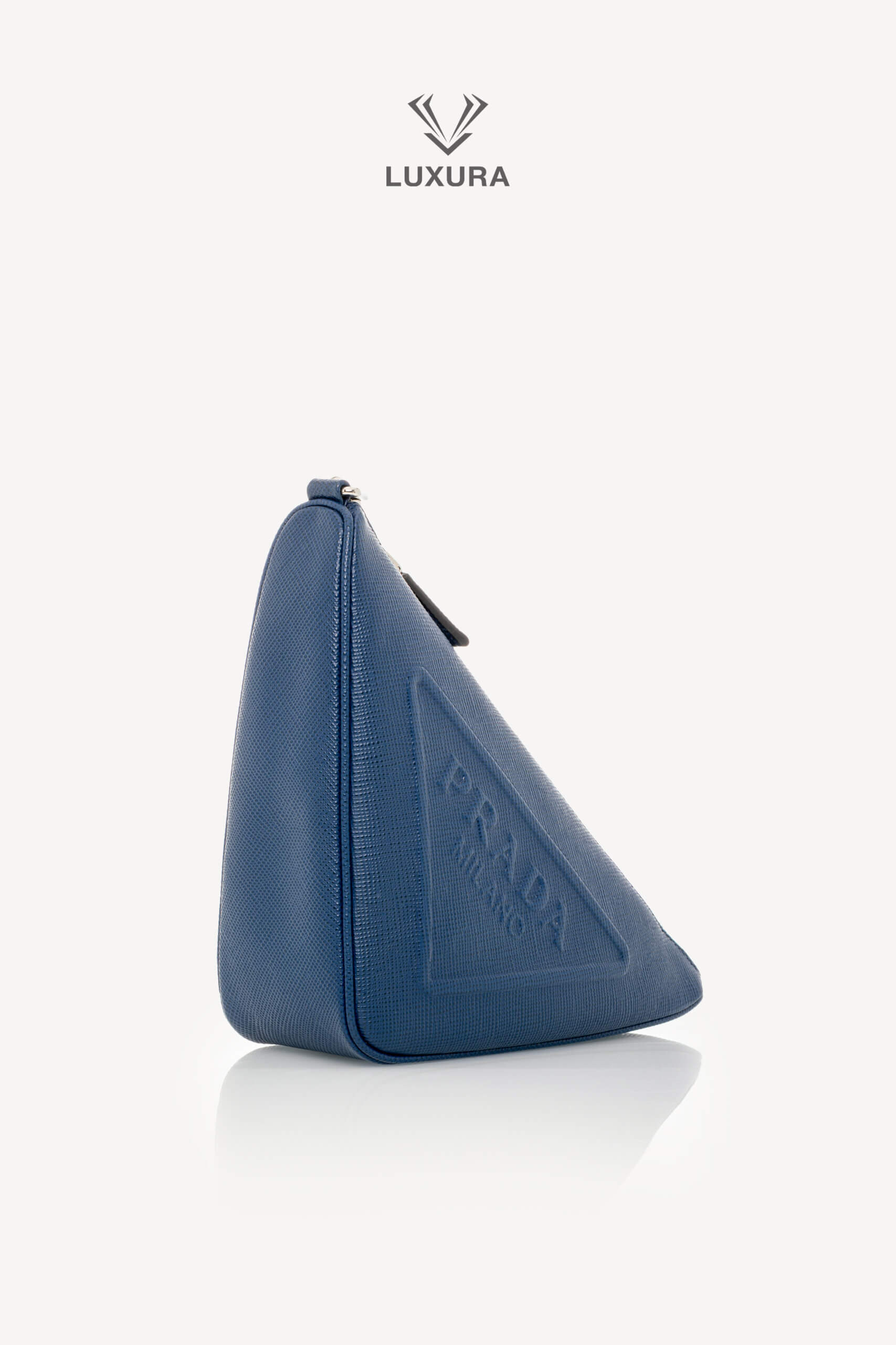 <span style="font-size: 10px;letter-spacing: .15em">BEST DEAL</span><br>            <strong>PRADA</strong><br>            <div style="margin-top:10px;font-size:16px">Triangle Logo Wristlet Pouch Embossed Saffiano Leather Blue</div><br> - Image 3