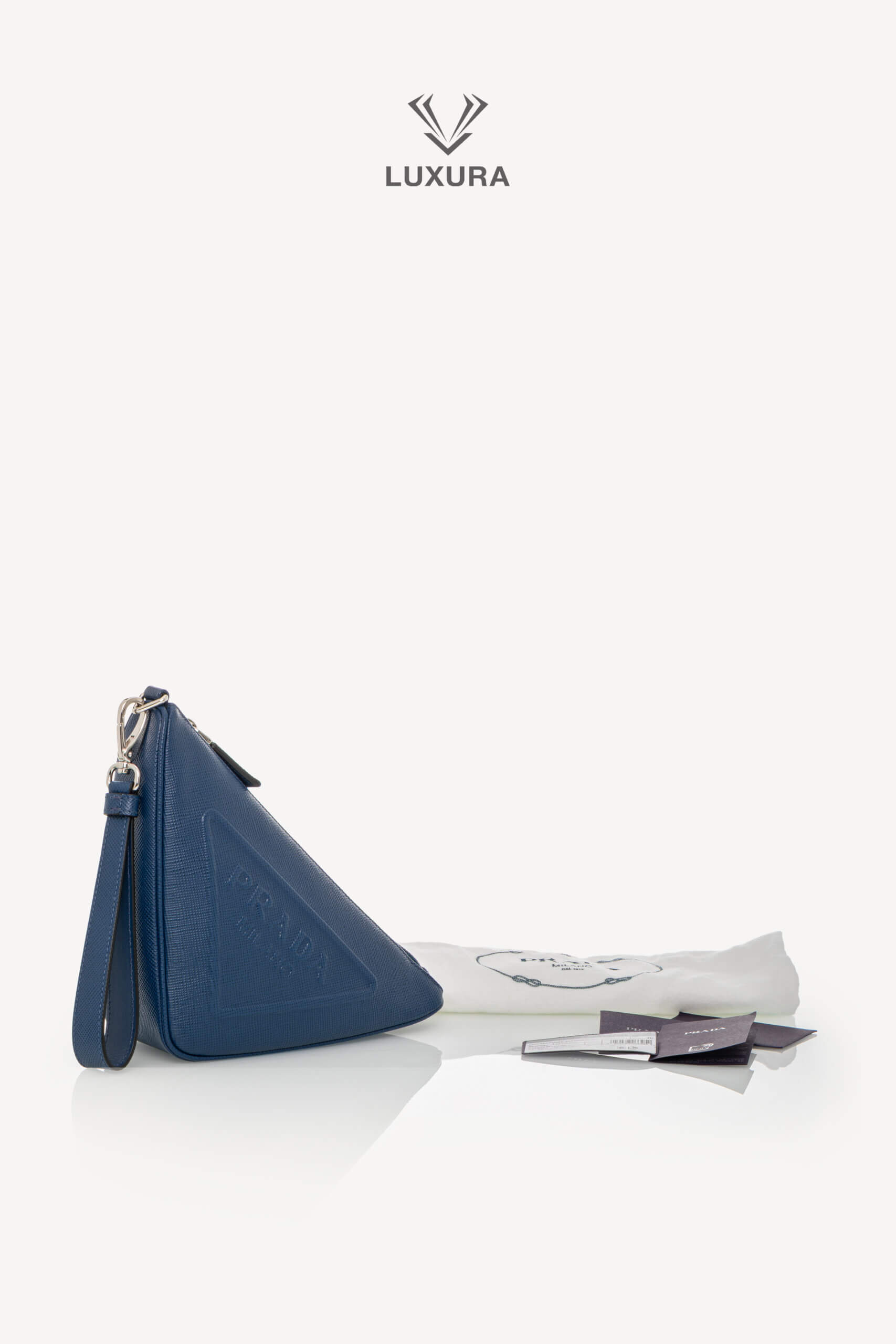 <span style="font-size: 10px;letter-spacing: .15em">BEST DEAL</span><br>            <strong>PRADA</strong><br>            <div style="margin-top:10px;font-size:16px">Triangle Logo Wristlet Pouch Embossed Saffiano Leather Blue</div><br> - Image 2