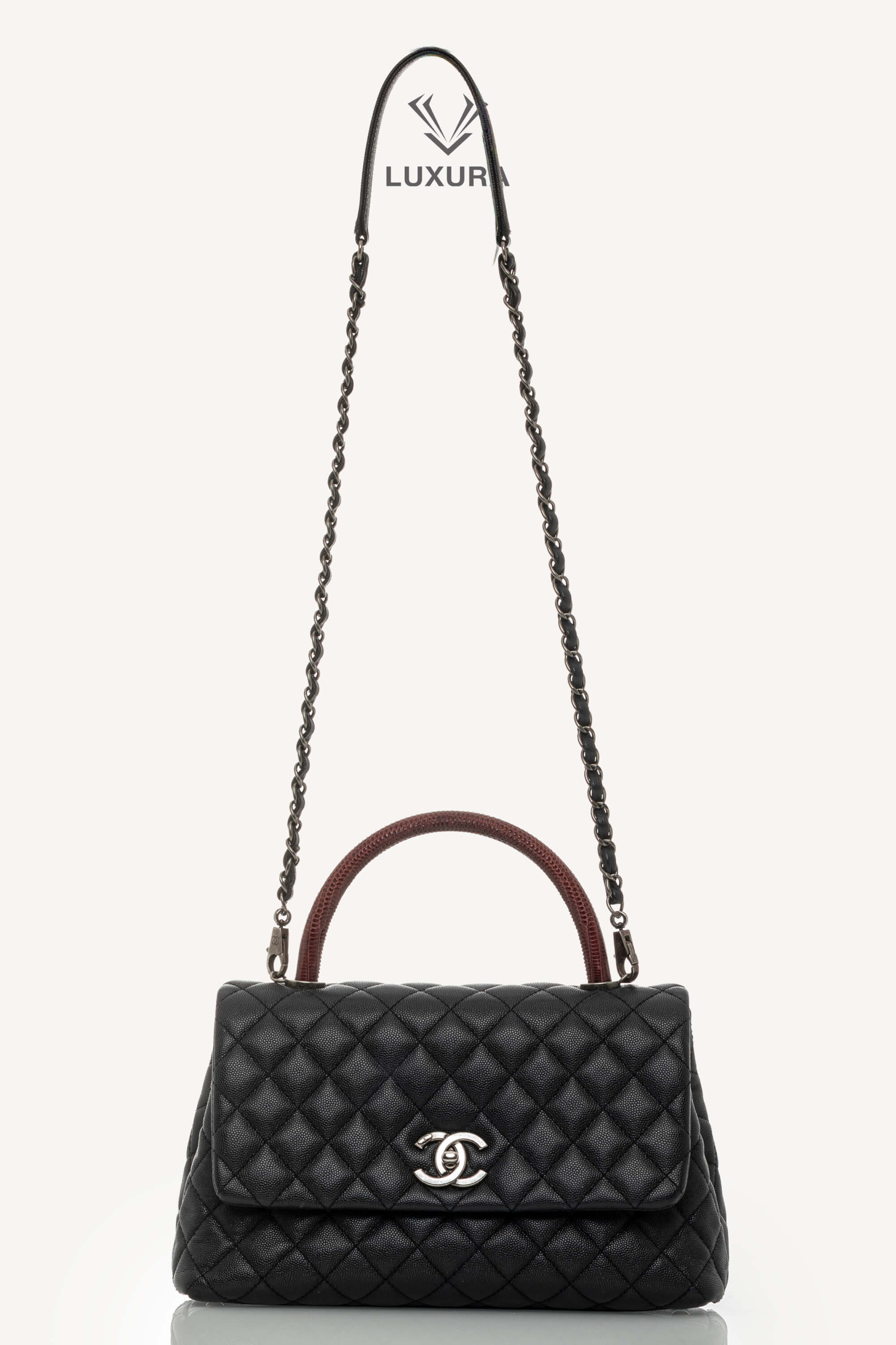 <span style="font-size: 10px;letter-spacing: .15em">HARD TO FIND</span><br> <strong>CHANEL</strong><br> <div style="margin-top:10px;font-size:16px">Lizard Embossed Quilted Large Coco Handle Flap Black</div><br> - Image 4