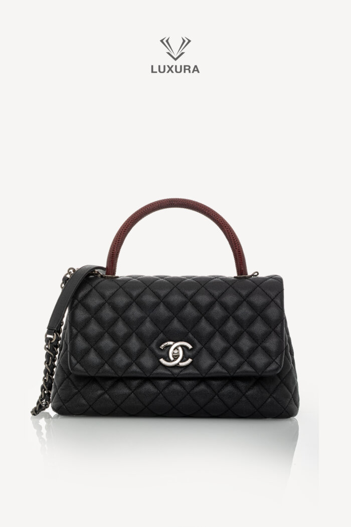 <span style="font-size: 10px;letter-spacing: .15em">HARD TO FIND</span><br>            <strong>CHANEL</strong><br>            <div style="margin-top:10px;font-size:16px">Lizard Embossed Quilted Large Coco Handle Flap Black</div><br>