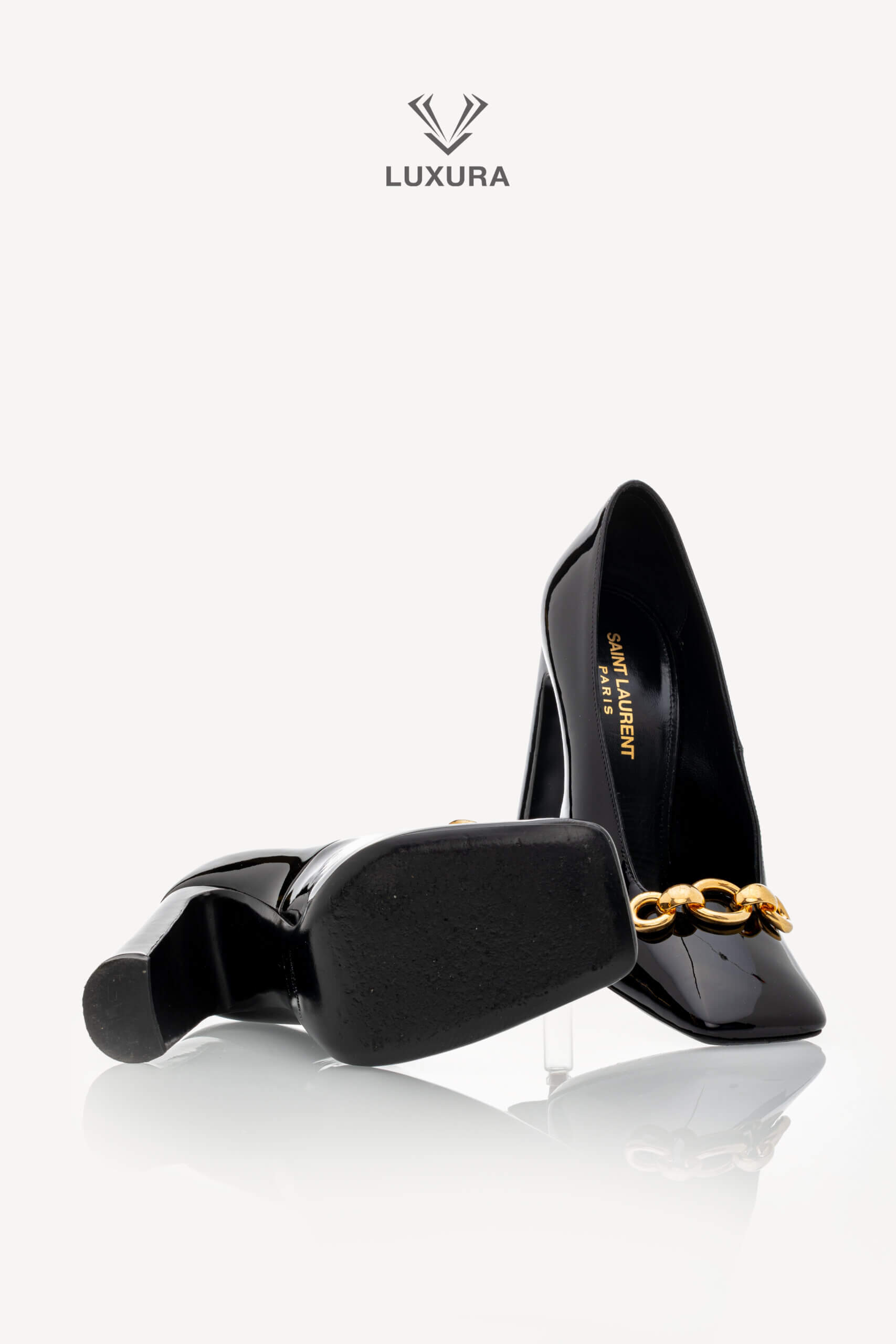 <span style="font-size: 10px;letter-spacing: .15em">NEW COLLECTION</span><br> <strong>SAINT LAURENT</strong><br> <div style="margin-top:10px;font-size:16px">Patent Silvana Pumps Black 37</div><br> - Image 19