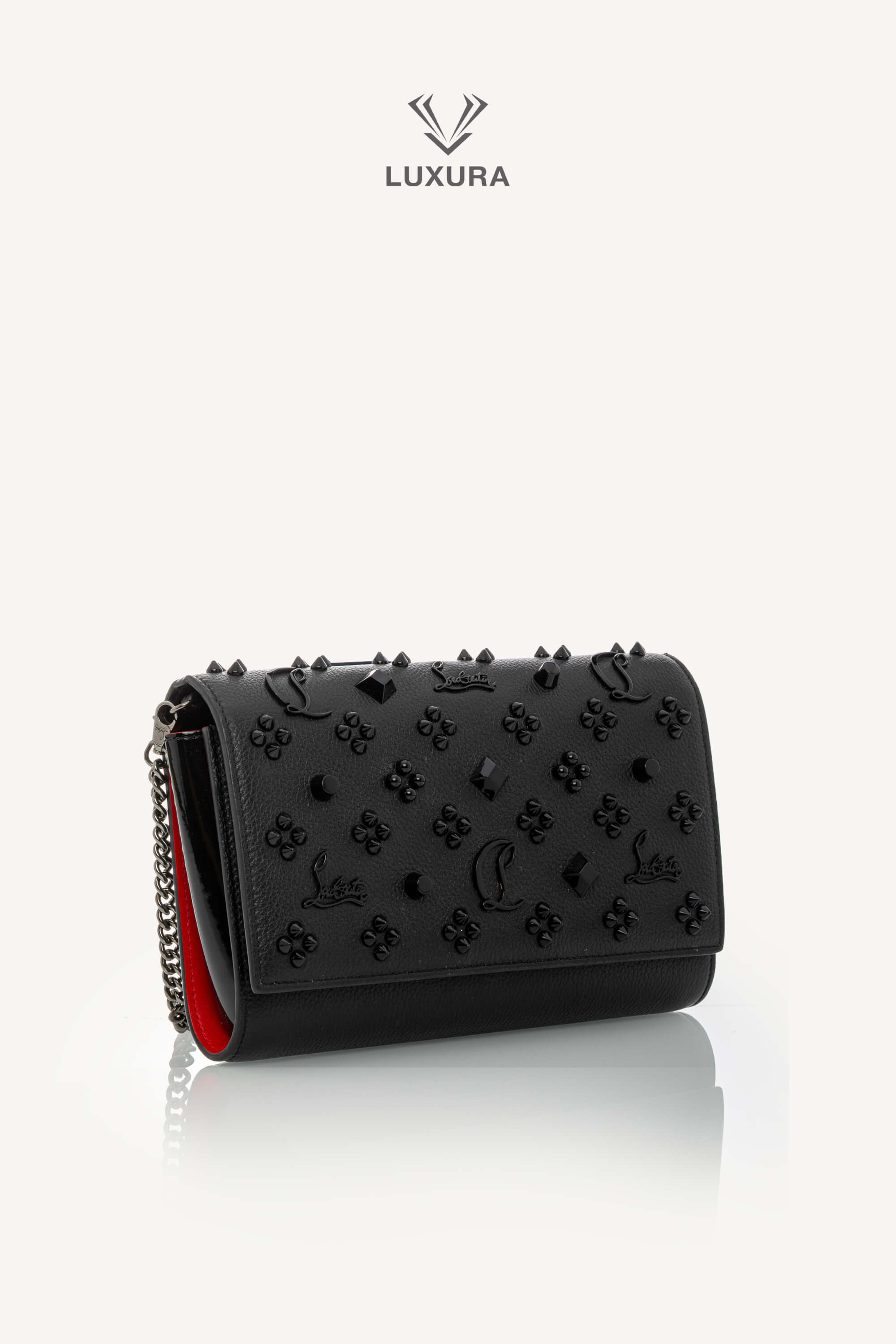 <span style="font-size: 10px;letter-spacing: .15em">BEST DEAL</span><br>            <strong>CHRISTIAN LOUBOUTIN</strong><br>            <div style="margin-top:10px;font-size:16px">Paloma Clutch Grained Calf Leather and Spikes Loubinthesky Black</div><br> - Image 3