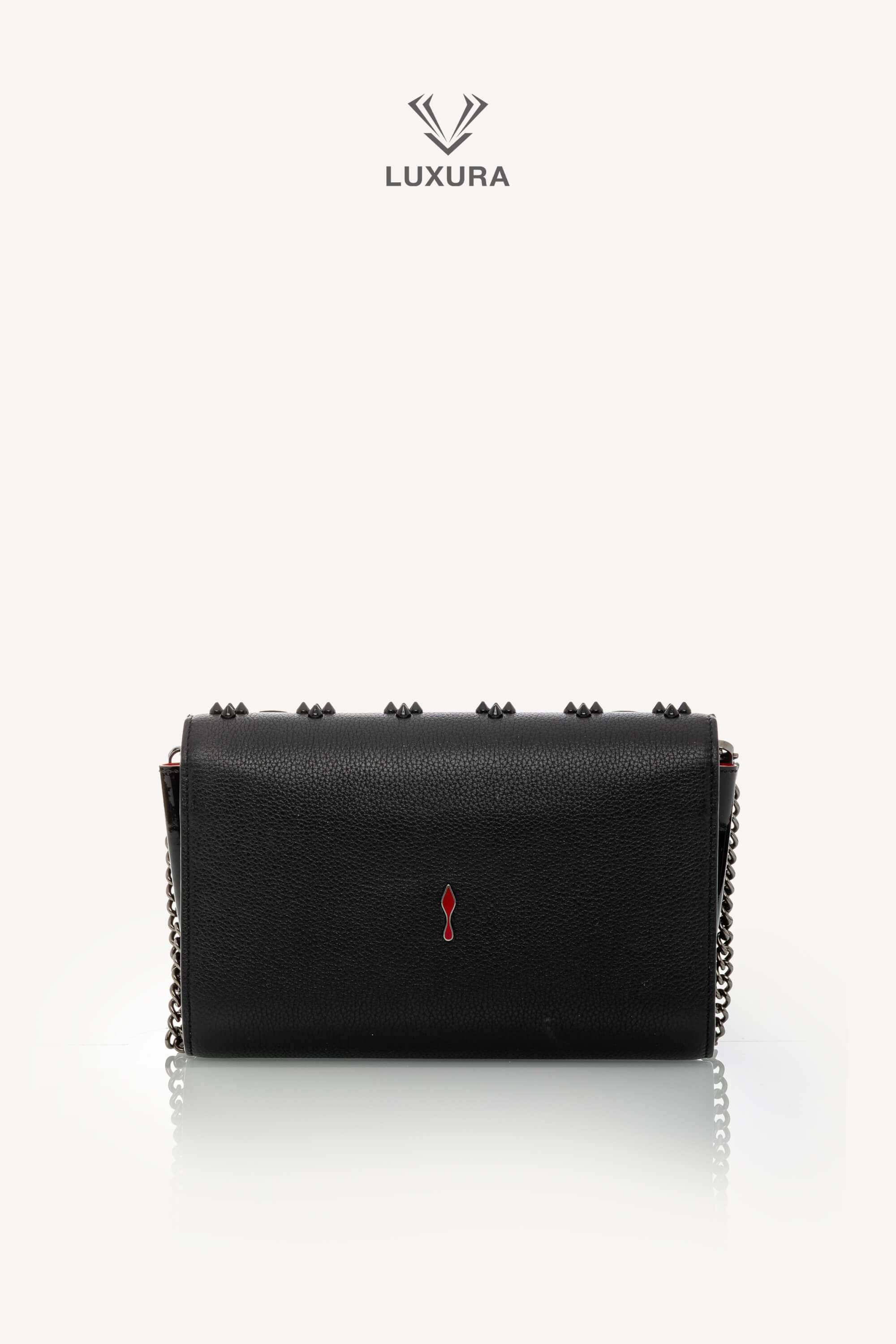 <span style="font-size: 10px;letter-spacing: .15em">BEST DEAL</span><br>            <strong>CHRISTIAN LOUBOUTIN</strong><br>            <div style="margin-top:10px;font-size:16px">Paloma Clutch Grained Calf Leather and Spikes Loubinthesky Black</div><br> - Image 6