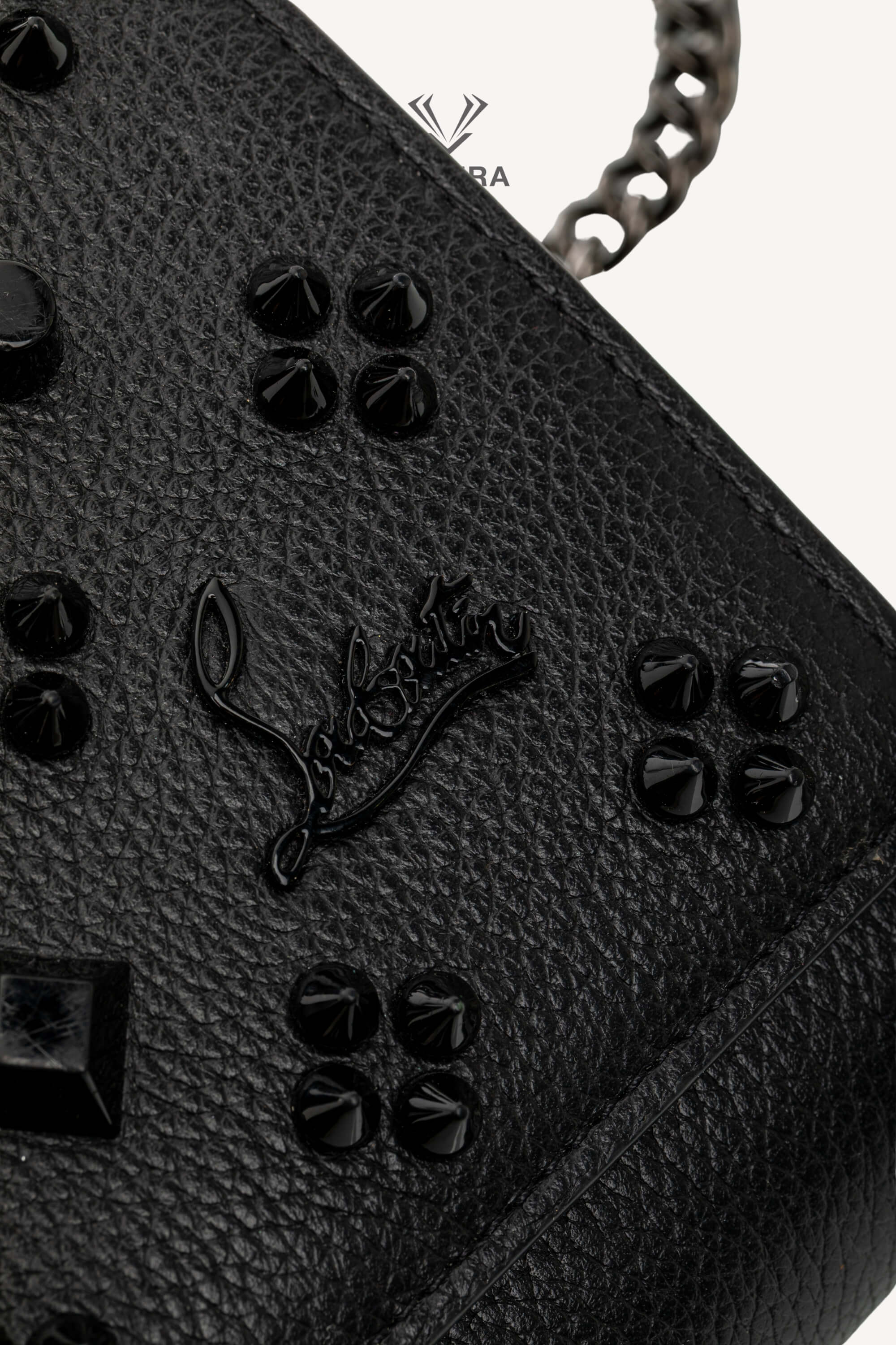<span style="font-size: 10px;letter-spacing: .15em">BEST DEAL</span><br>            <strong>CHRISTIAN LOUBOUTIN</strong><br>            <div style="margin-top:10px;font-size:16px">Paloma Clutch Grained Calf Leather and Spikes Loubinthesky Black</div><br> - Image 17