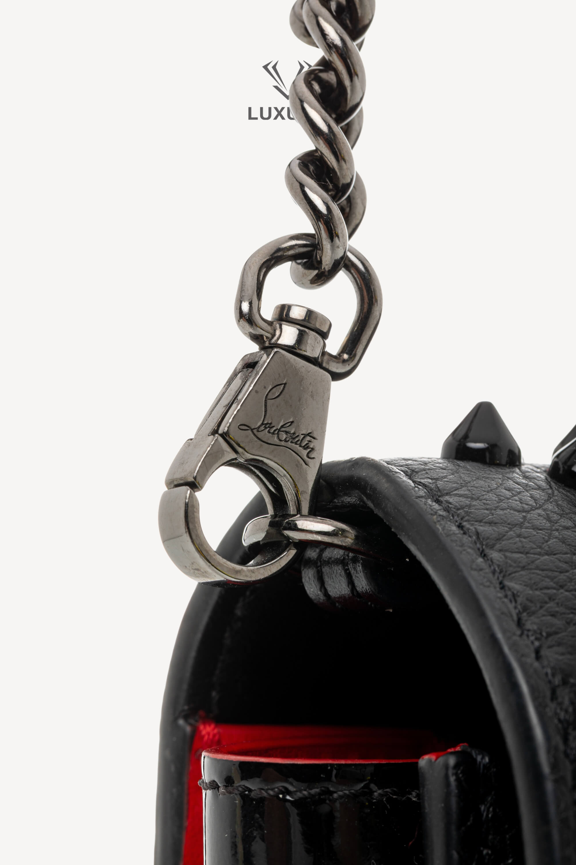 <span style="font-size: 10px;letter-spacing: .15em">BEST DEAL</span><br>            <strong>CHRISTIAN LOUBOUTIN</strong><br>            <div style="margin-top:10px;font-size:16px">Paloma Clutch Grained Calf Leather and Spikes Loubinthesky Black</div><br> - Image 18
