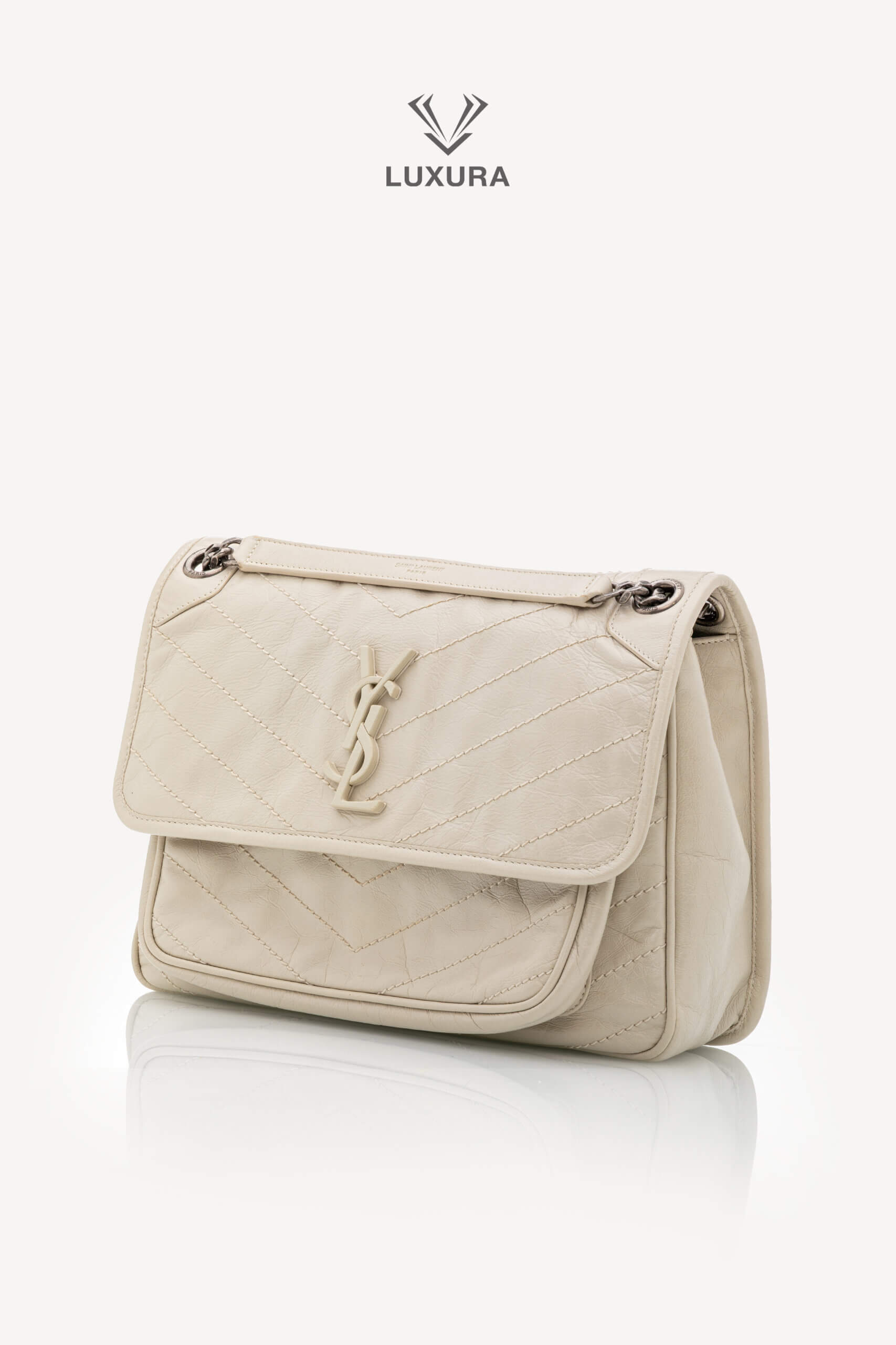 <span style="font-size: 10px;letter-spacing: .15em">BEST DEAL</span><br>            <strong>SAINT LAURENT</strong><br>            <div style="margin-top:10px;font-size:16px">Niki Medium in White Vintage Leather</div><br> - Image 7