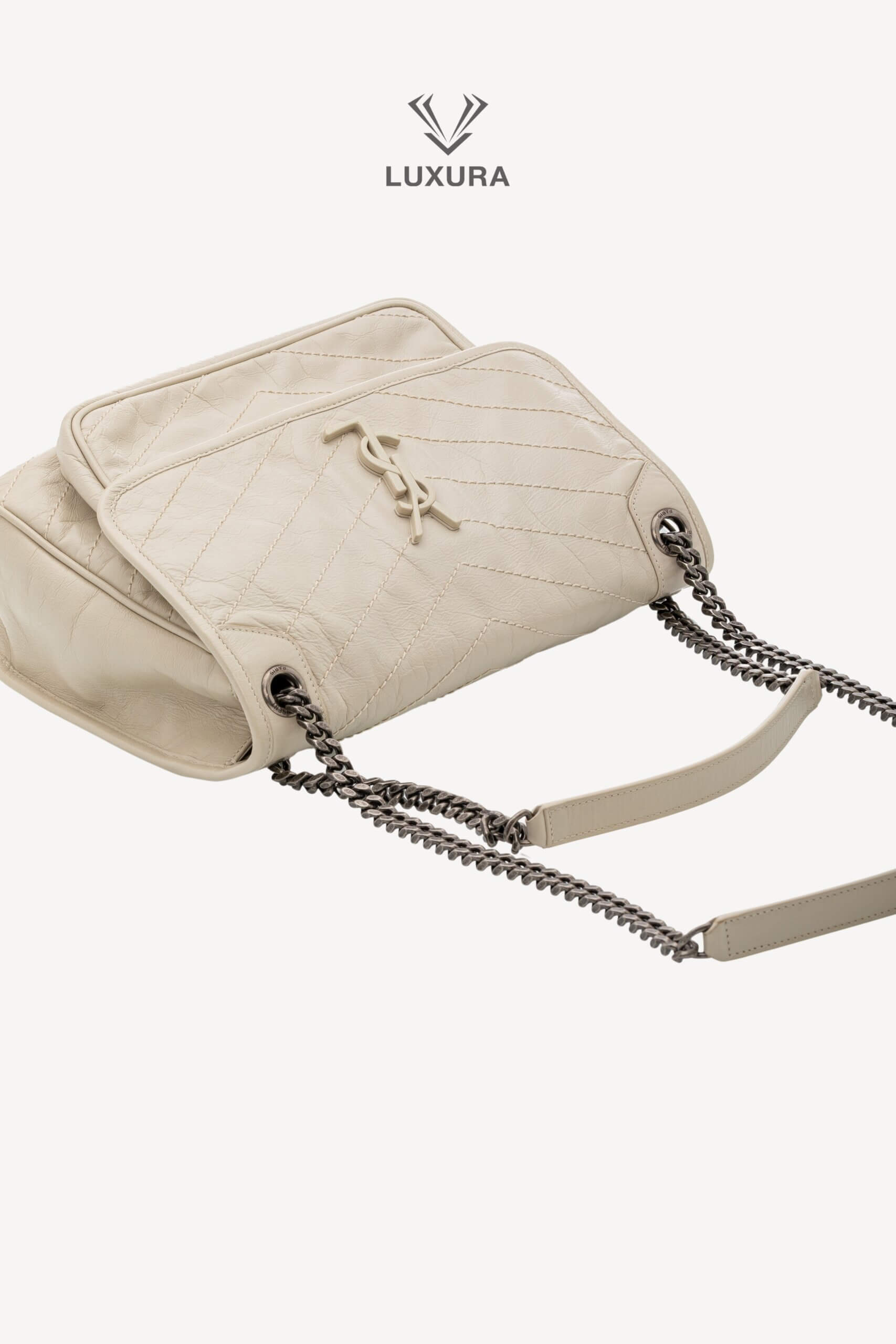 <span style="font-size: 10px;letter-spacing: .15em">BEST DEAL</span><br>            <strong>SAINT LAURENT</strong><br>            <div style="margin-top:10px;font-size:16px">Niki Medium in White Vintage Leather</div><br> - Image 5