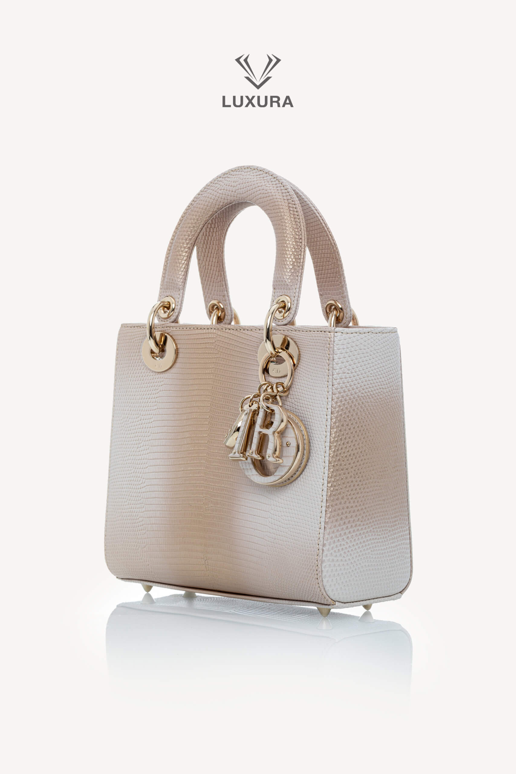 <span style="font-size: 10px;letter-spacing: .15em">HARD TO FIND</span><br>            <strong>CHRISTIAN DIOR</strong><br>            <div style="margin-top:10px;font-size:16px">Small Lady Dior Bag in Gold-Ivory Lizard Leather with Gold Hardware</div><br> - Image 6
