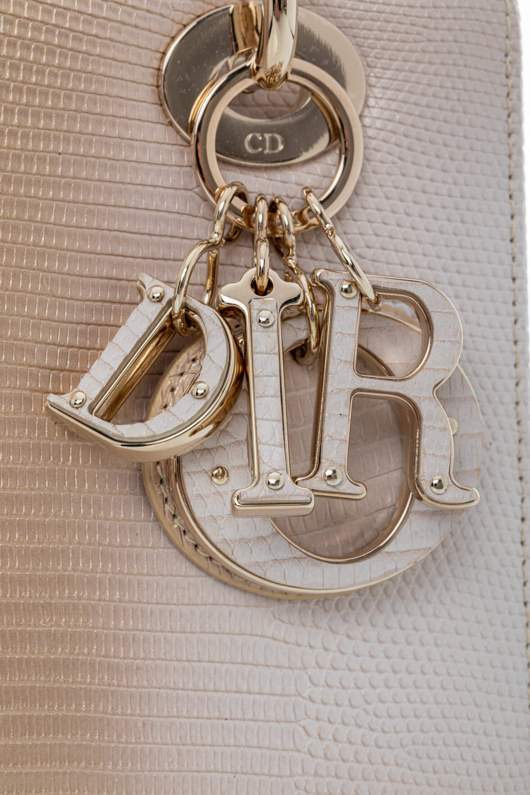 <span style="font-size: 10px;letter-spacing: .15em">HARD TO FIND</span><br>            <strong>CHRISTIAN DIOR</strong><br>            <div style="margin-top:10px;font-size:16px">Small Lady Dior Bag in Gold-Ivory Lizard Leather with Gold Hardware</div><br> - Image 9