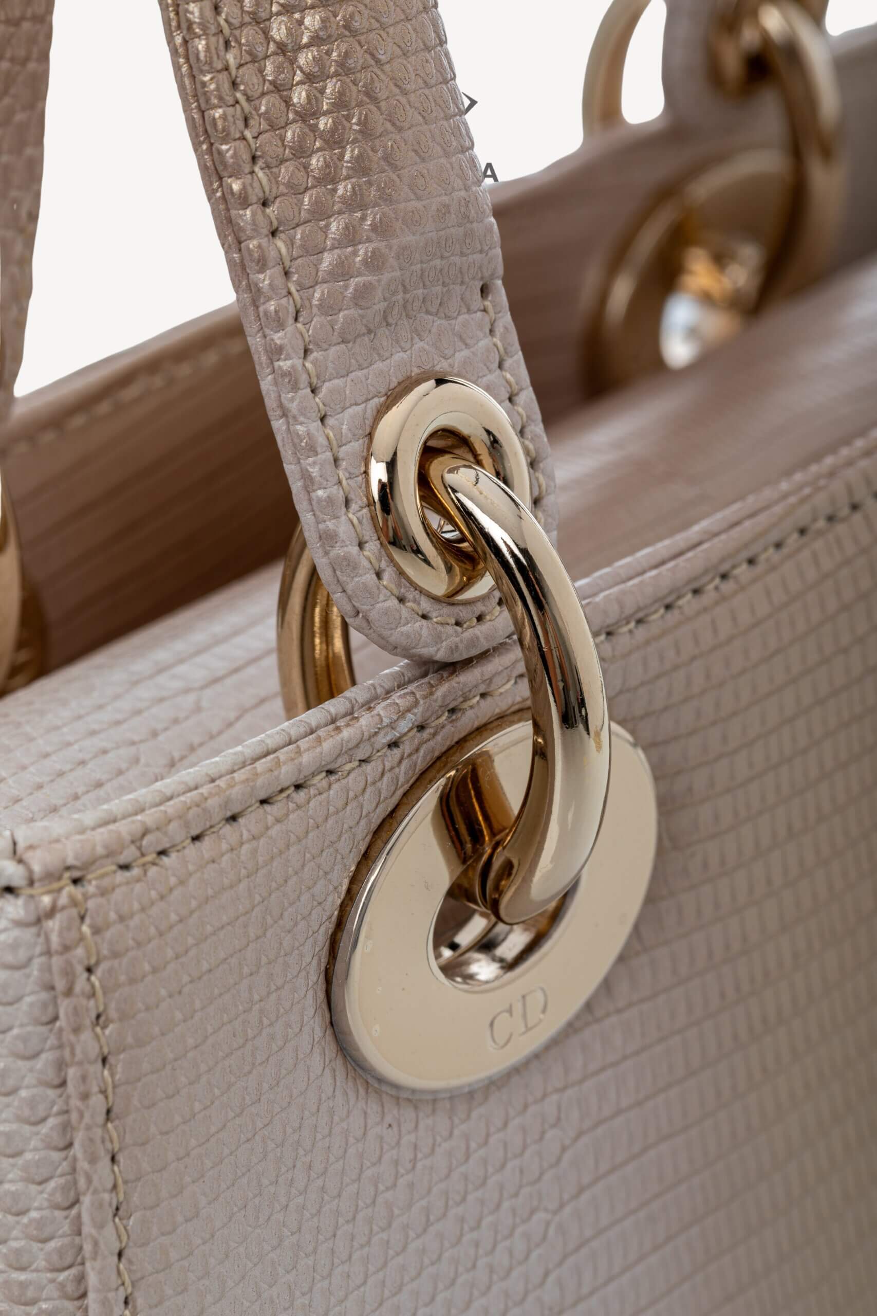<span style="font-size: 10px;letter-spacing: .15em">HARD TO FIND</span><br>            <strong>CHRISTIAN DIOR</strong><br>            <div style="margin-top:10px;font-size:16px">Small Lady Dior Bag in Gold-Ivory Lizard Leather with Gold Hardware</div><br> - Image 12