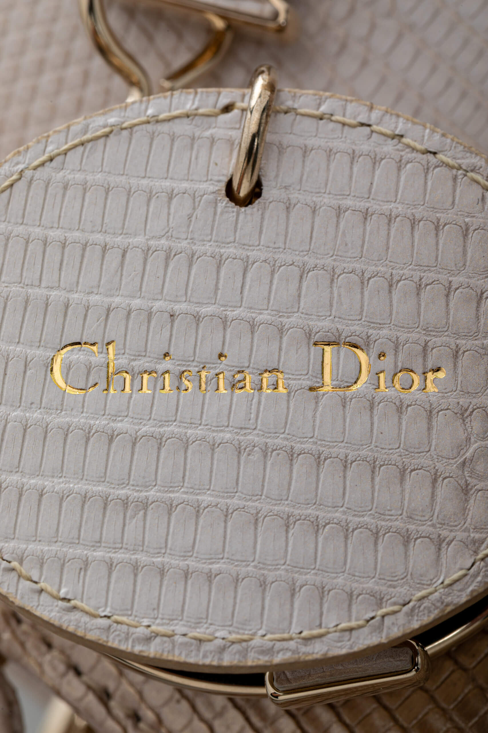 <span style="font-size: 10px;letter-spacing: .15em">HARD TO FIND</span><br>            <strong>CHRISTIAN DIOR</strong><br>            <div style="margin-top:10px;font-size:16px">Small Lady Dior Bag in Gold-Ivory Lizard Leather with Gold Hardware</div><br> - Image 23