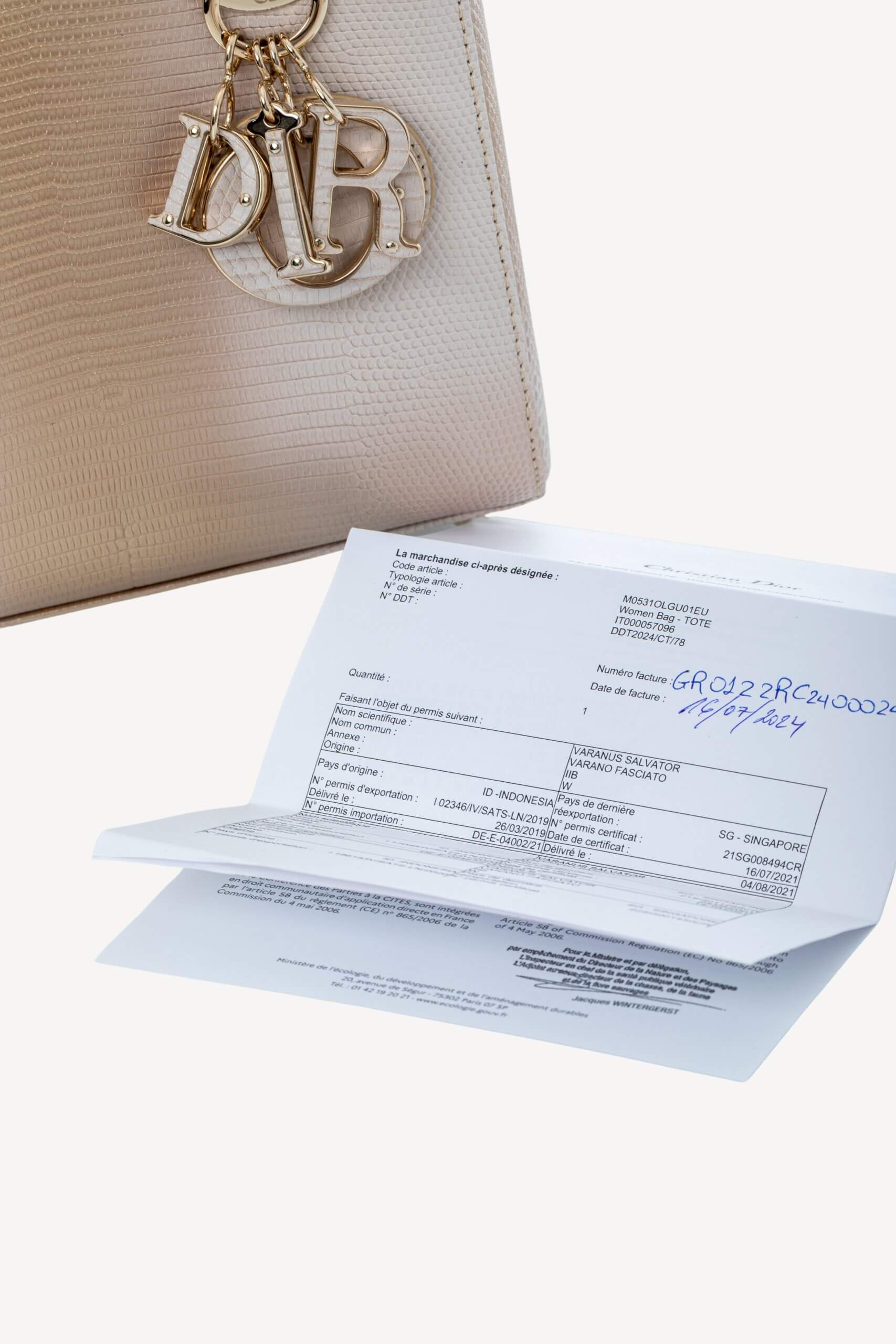 <span style="font-size: 10px;letter-spacing: .15em">HARD TO FIND</span><br>            <strong>CHRISTIAN DIOR</strong><br>            <div style="margin-top:10px;font-size:16px">Small Lady Dior Bag in Gold-Ivory Lizard Leather with Gold Hardware</div><br> - Image 25