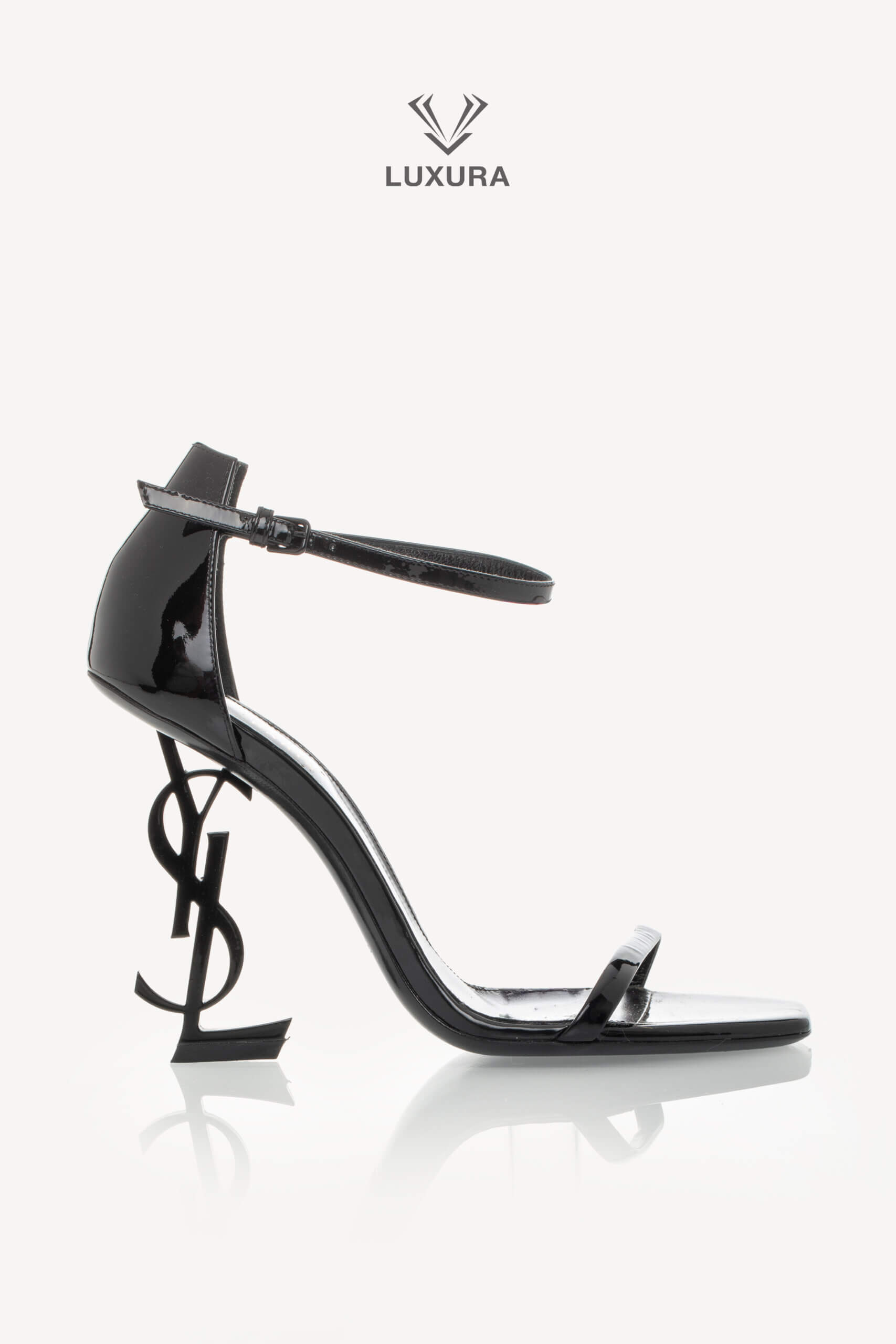 <span style="font-size: 10px;letter-spacing: .15em">BEST DEAL</span><br>            <strong>SAINT LAURENT</strong><br>            <div style="margin-top:10px;font-size:16px">Patent Calfskin Opyum 85 Sandals Black 36.5</div><br>