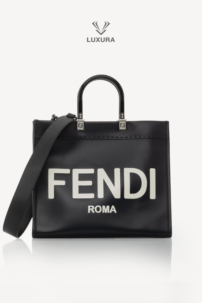 <span style="font-size: 10px;letter-spacing: .15em">BEST DEAL</span><br>            <strong>FENDI</strong><br>            <div style="margin-top:10px;font-size:16px">Vitello King Plexiglass Medium Fendi Sunshine Shopper Tote Black White</div><br>