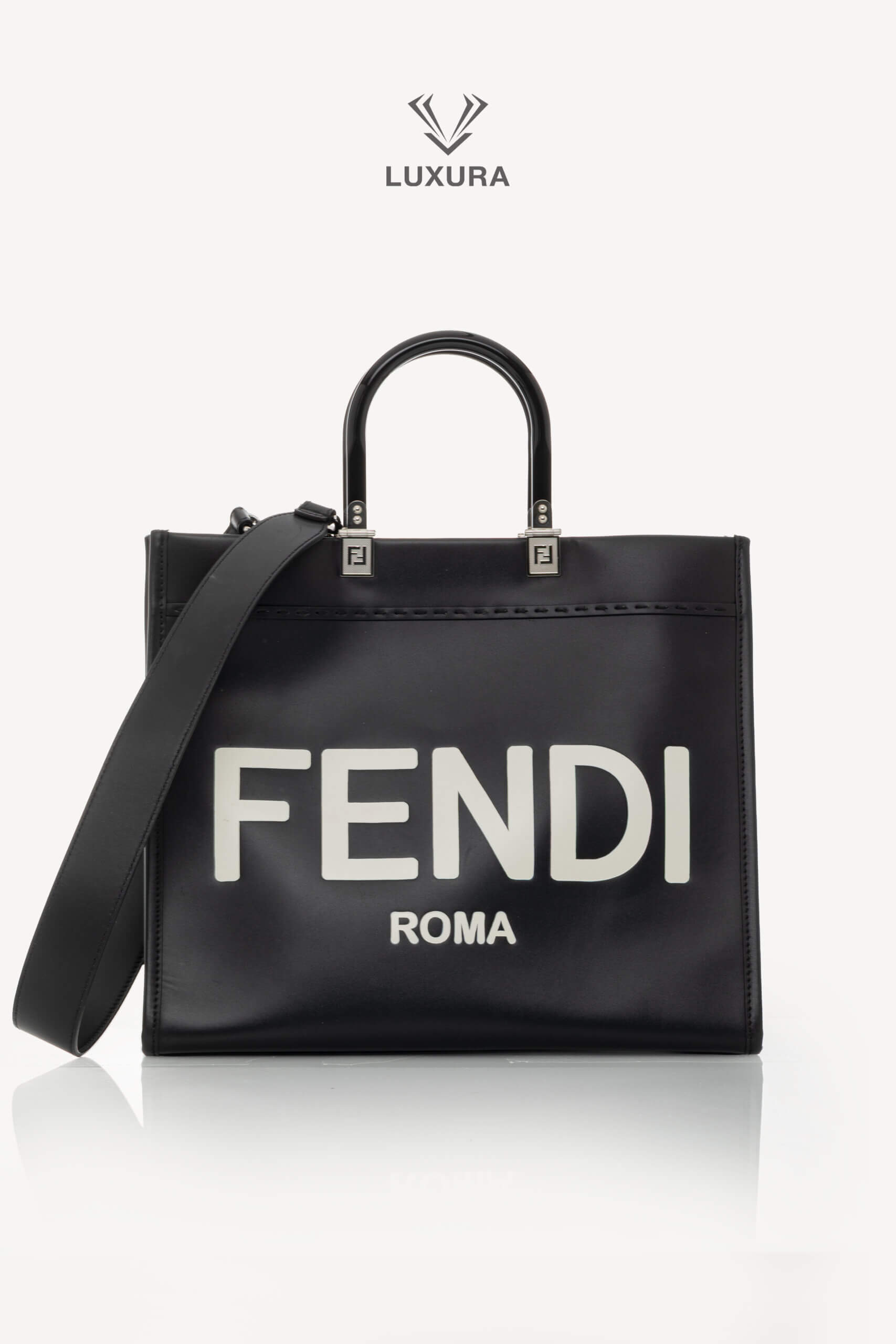 <span style="font-size: 10px;letter-spacing: .15em">BEST DEAL</span><br>            <strong>FENDI</strong><br>            <div style="margin-top:10px;font-size:16px">Vitello King Plexiglass Medium Fendi Sunshine Shopper Tote Black White</div><br>