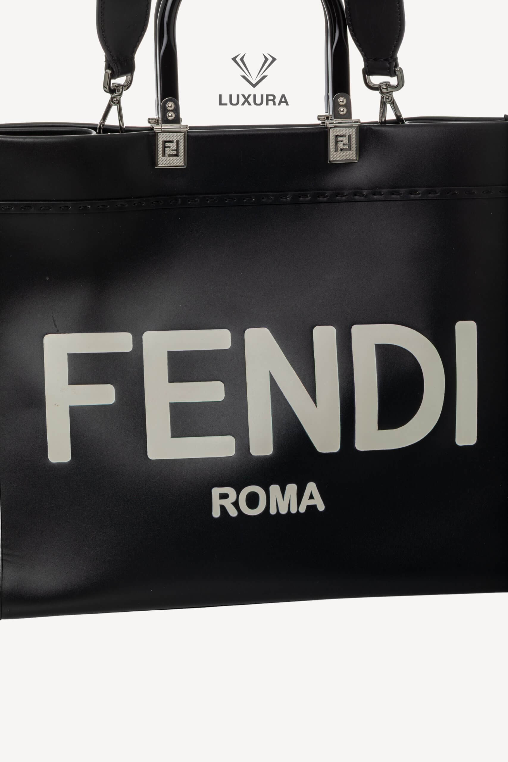 <span style="font-size: 10px;letter-spacing: .15em">BEST DEAL</span><br>            <strong>FENDI</strong><br>            <div style="margin-top:10px;font-size:16px">Vitello King Plexiglass Medium Fendi Sunshine Shopper Tote Black White</div><br> - Image 6