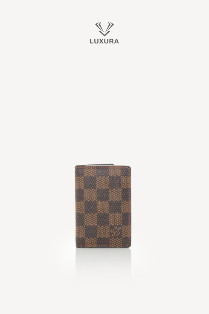 <span style="font-size: 10px;letter-spacing: .15em">HARD TO FIND</span><br>            <strong>LOUIS VUITTON</strong><br>            <div style="margin-top:10px;font-size:16px">Damier Ebene Canvas Pocket Organizer</div><br>