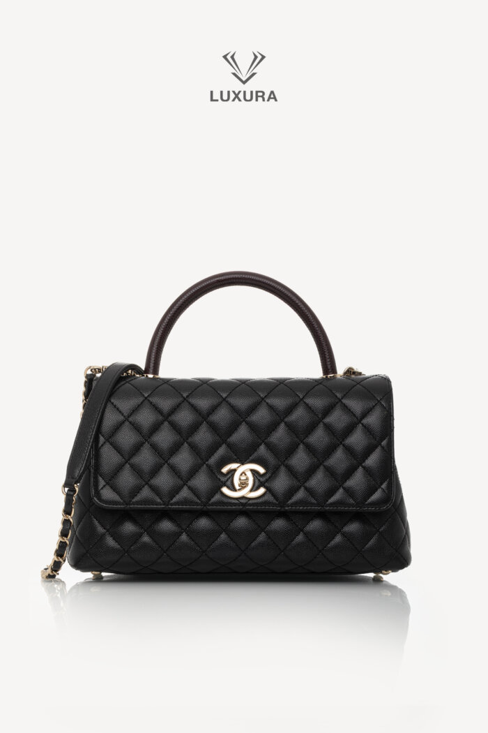 <span style="font-size: 10px;letter-spacing: .15em">HARD TO FIND</span><br> <strong>CHANEL</strong><br> <div style="margin-top:10px;font-size:16px">Quilted Caviar and Lizard Embossed Large Coco Top Handle Black</div><br>
