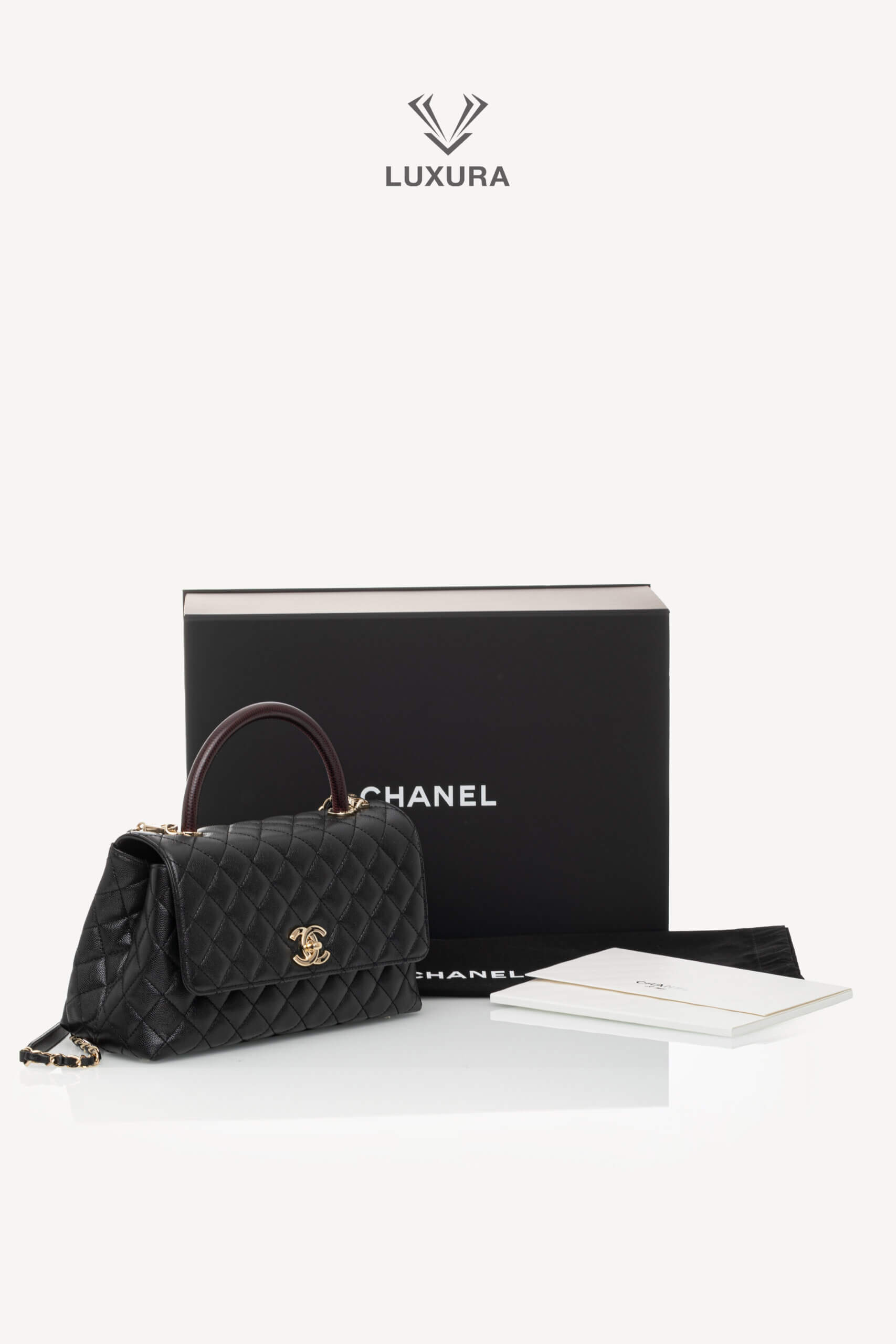 <span style="font-size: 10px;letter-spacing: .15em">HARD TO FIND</span><br>            <strong>CHANEL</strong><br>            <div style="margin-top:10px;font-size:16px">Quilted Caviar and Lizard Embossed Large Coco Top Handle Black</div><br> - Image 2