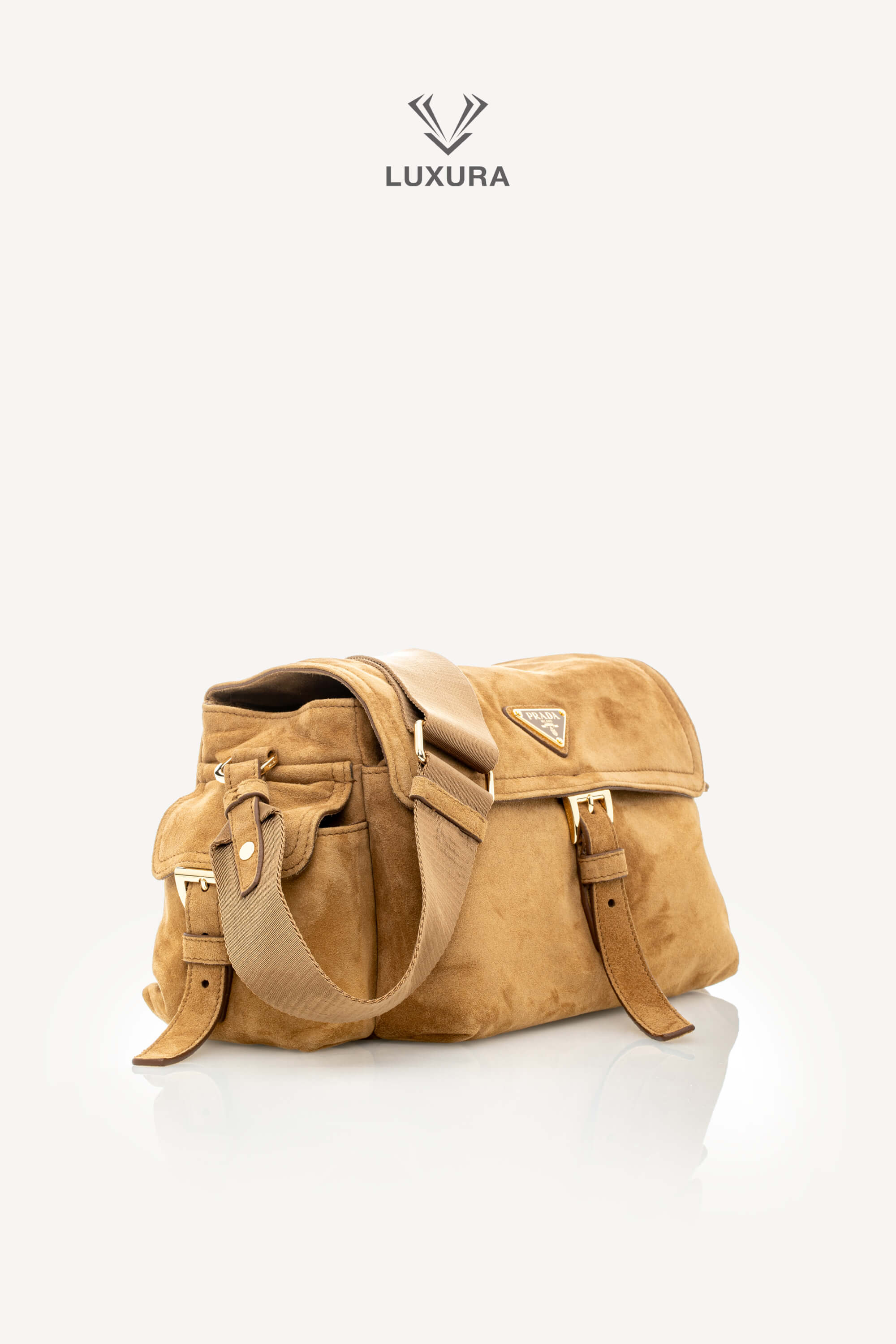 <span style="font-size: 10px;letter-spacing: .15em">NEW COLLECTION</span><br> <strong>PRADA</strong><br> <div style="margin-top:10px;font-size:16px">Explore Medium Suede Leather Shoulder Bag With Flap Cinnamon</div><br> - Image 3