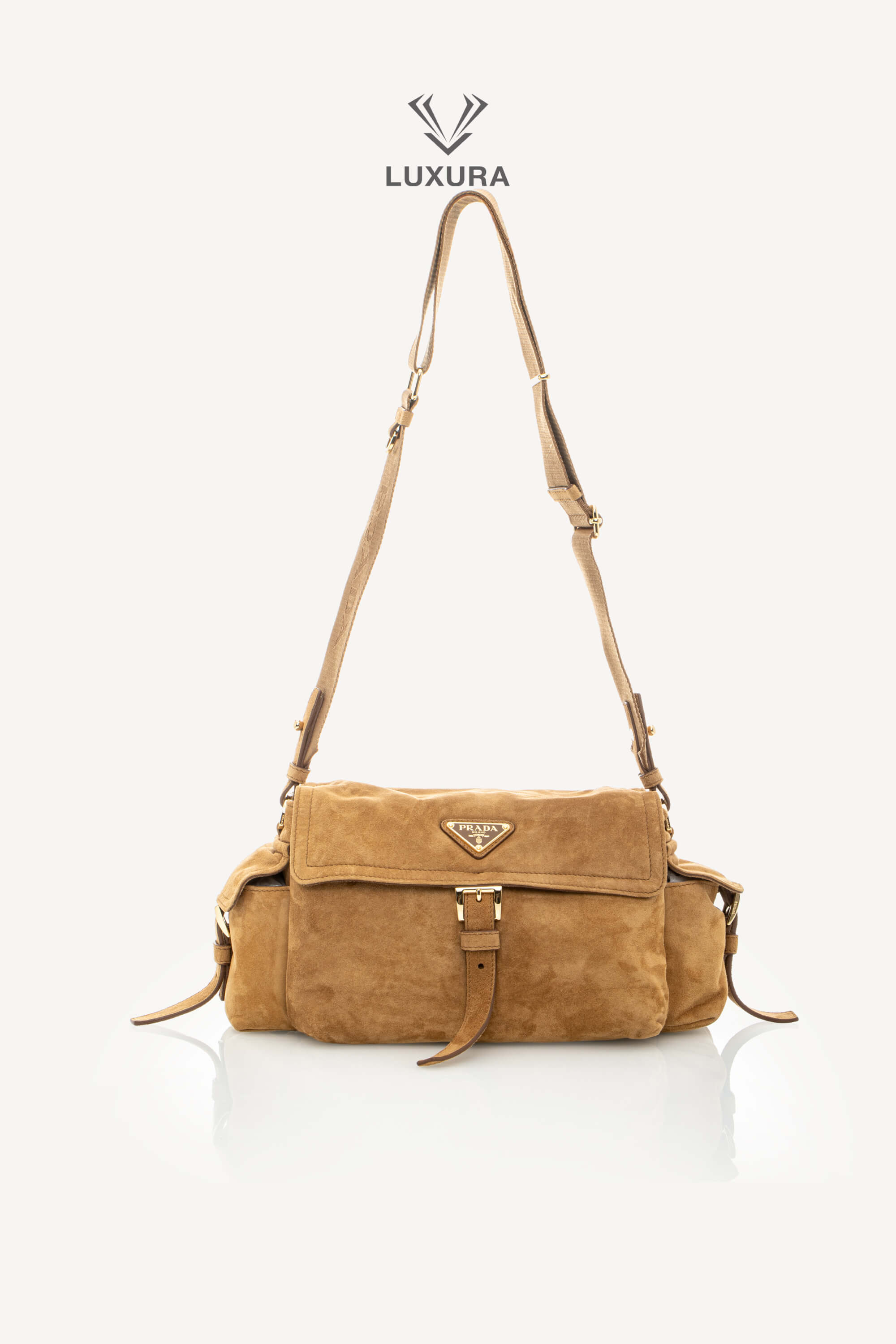 <span style="font-size: 10px;letter-spacing: .15em">NEW COLLECTION</span><br> <strong>PRADA</strong><br> <div style="margin-top:10px;font-size:16px">Explore Medium Suede Leather Shoulder Bag With Flap Cinnamon</div><br> - Image 6