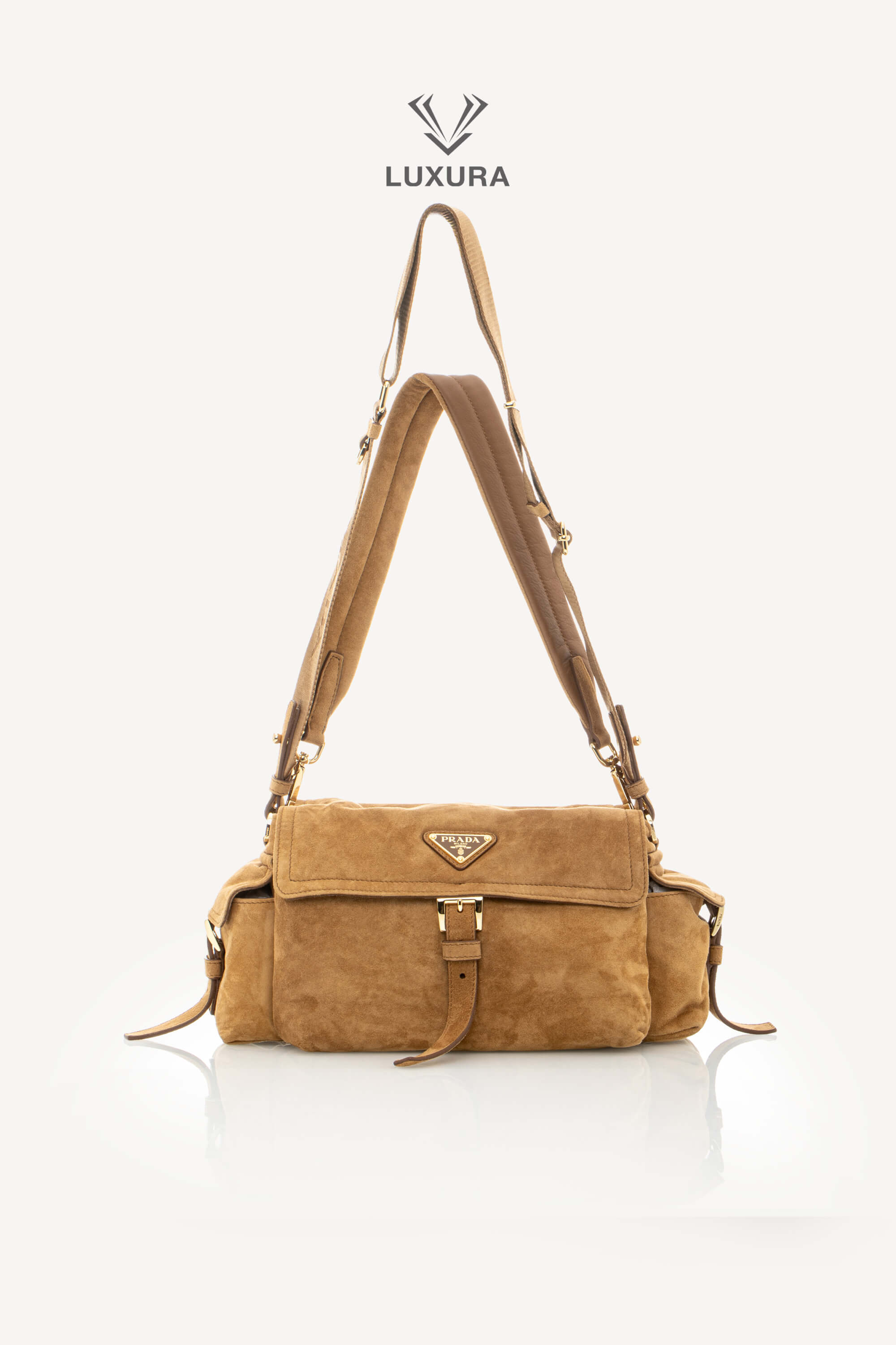 <span style="font-size: 10px;letter-spacing: .15em">NEW COLLECTION</span><br> <strong>PRADA</strong><br> <div style="margin-top:10px;font-size:16px">Explore Medium Suede Leather Shoulder Bag With Flap Cinnamon</div><br> - Image 5