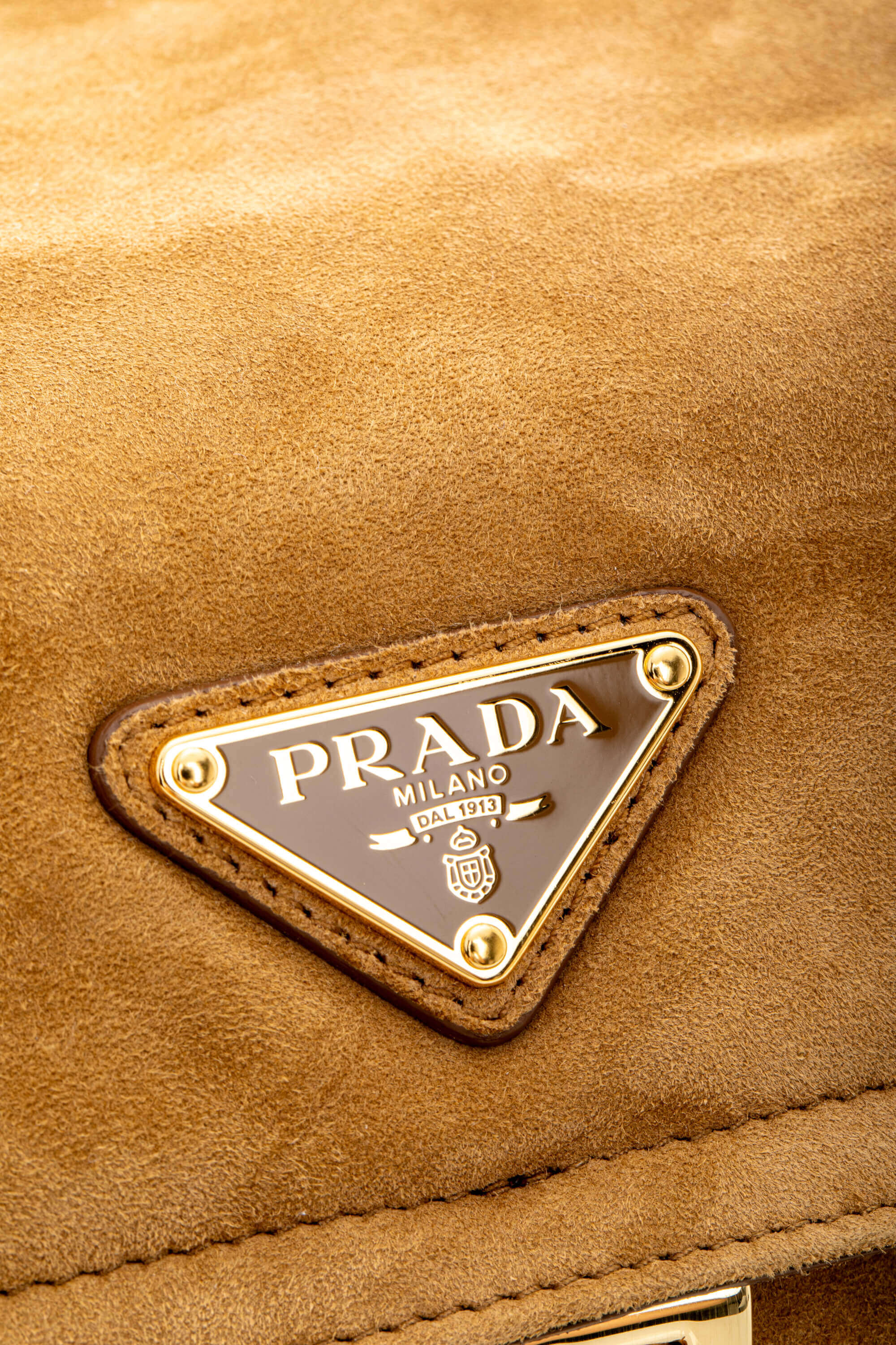 <span style="font-size: 10px;letter-spacing: .15em">NEW COLLECTION</span><br> <strong>PRADA</strong><br> <div style="margin-top:10px;font-size:16px">Explore Medium Suede Leather Shoulder Bag With Flap Cinnamon</div><br> - Image 10