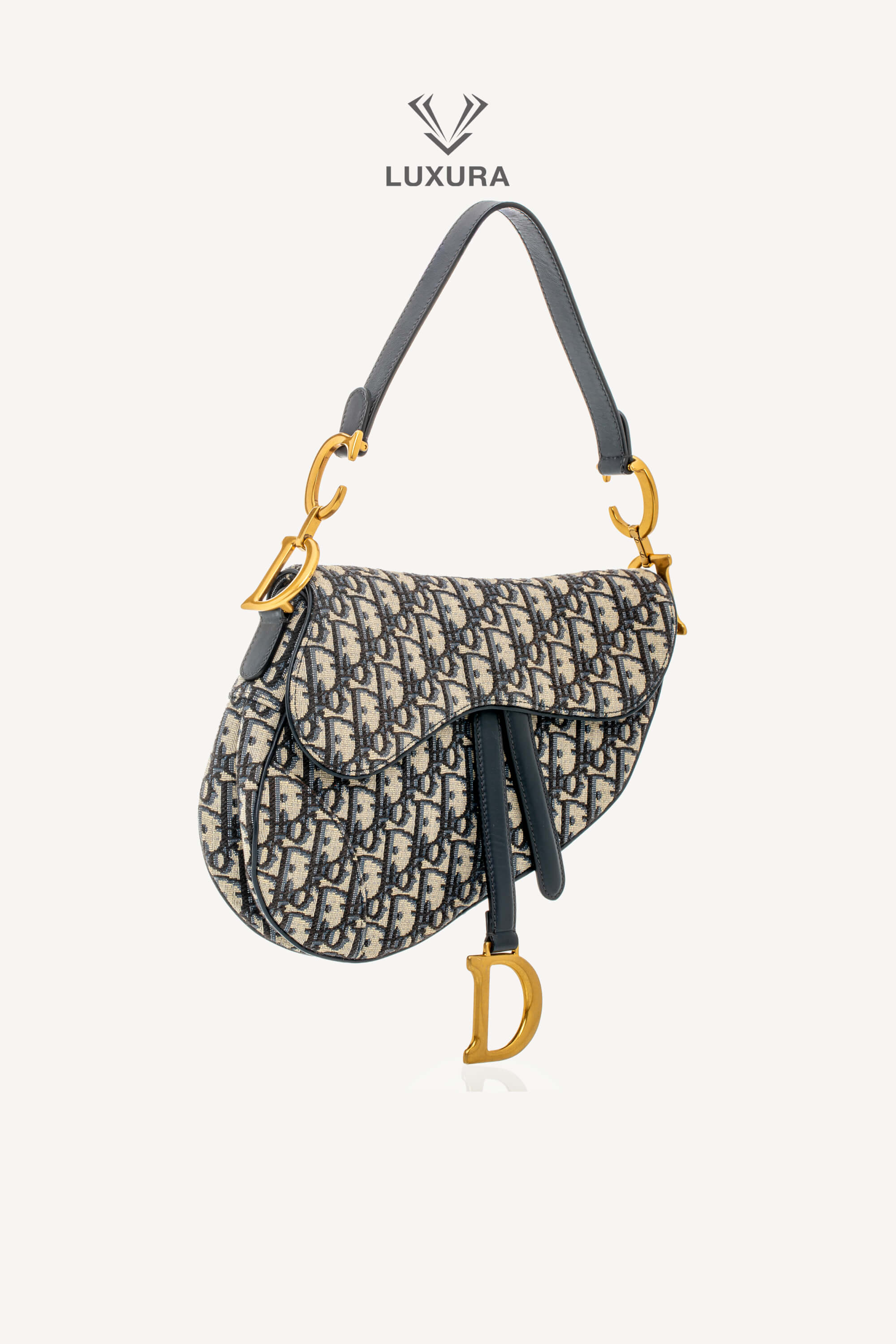 <span style="font-size: 10px;letter-spacing: .15em">BEST DEAL</span><br> <strong>CHRISTIAN DIOR</strong><br> <div style="margin-top:10px;font-size:16px">Saddle Bag Blue Dior Oblique Jacquard</div><br> - Image 26