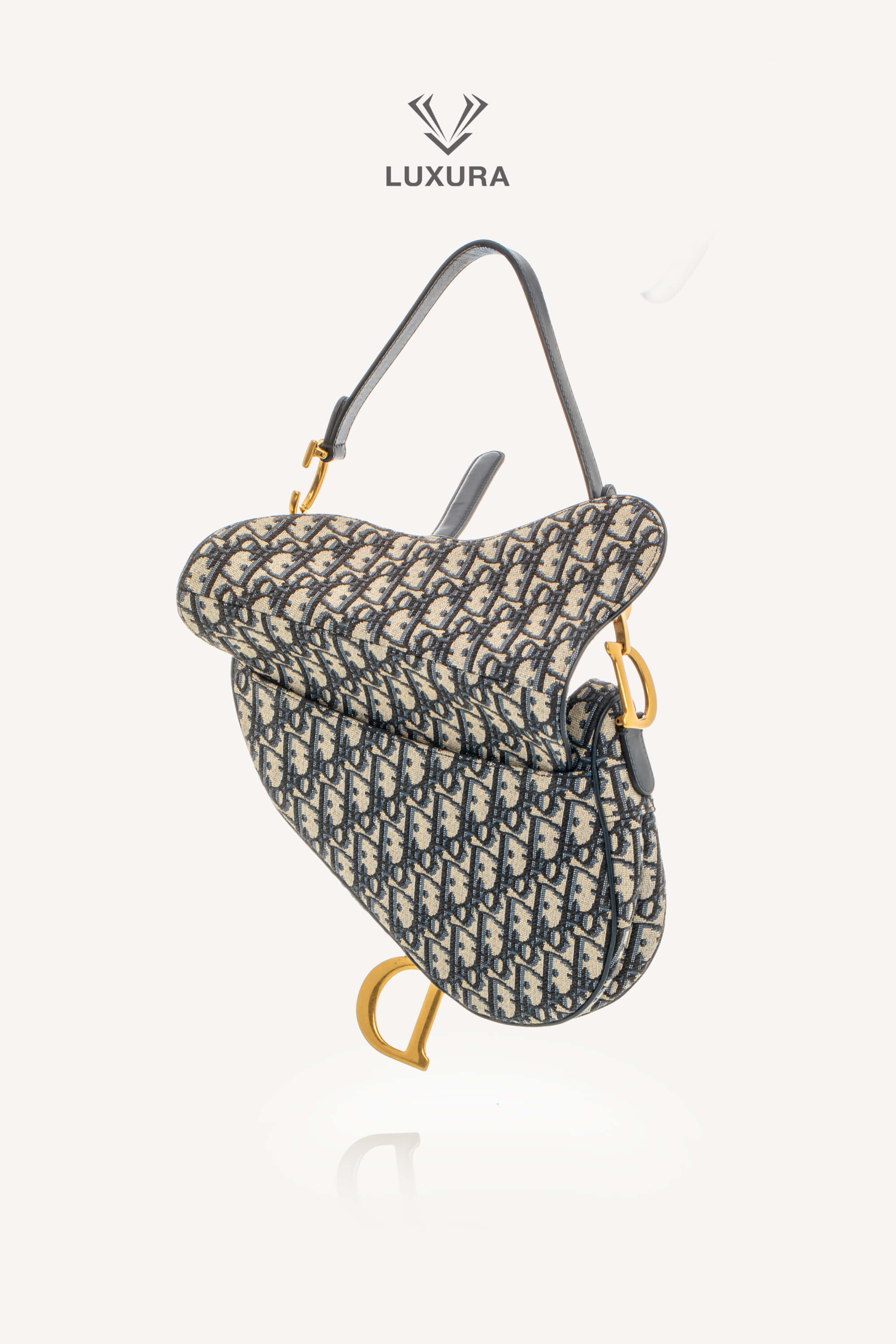 <span style="font-size: 10px;letter-spacing: .15em">BEST DEAL</span><br> <strong>CHRISTIAN DIOR</strong><br> <div style="margin-top:10px;font-size:16px">Saddle Bag Blue Dior Oblique Jacquard</div><br> - Image 3
