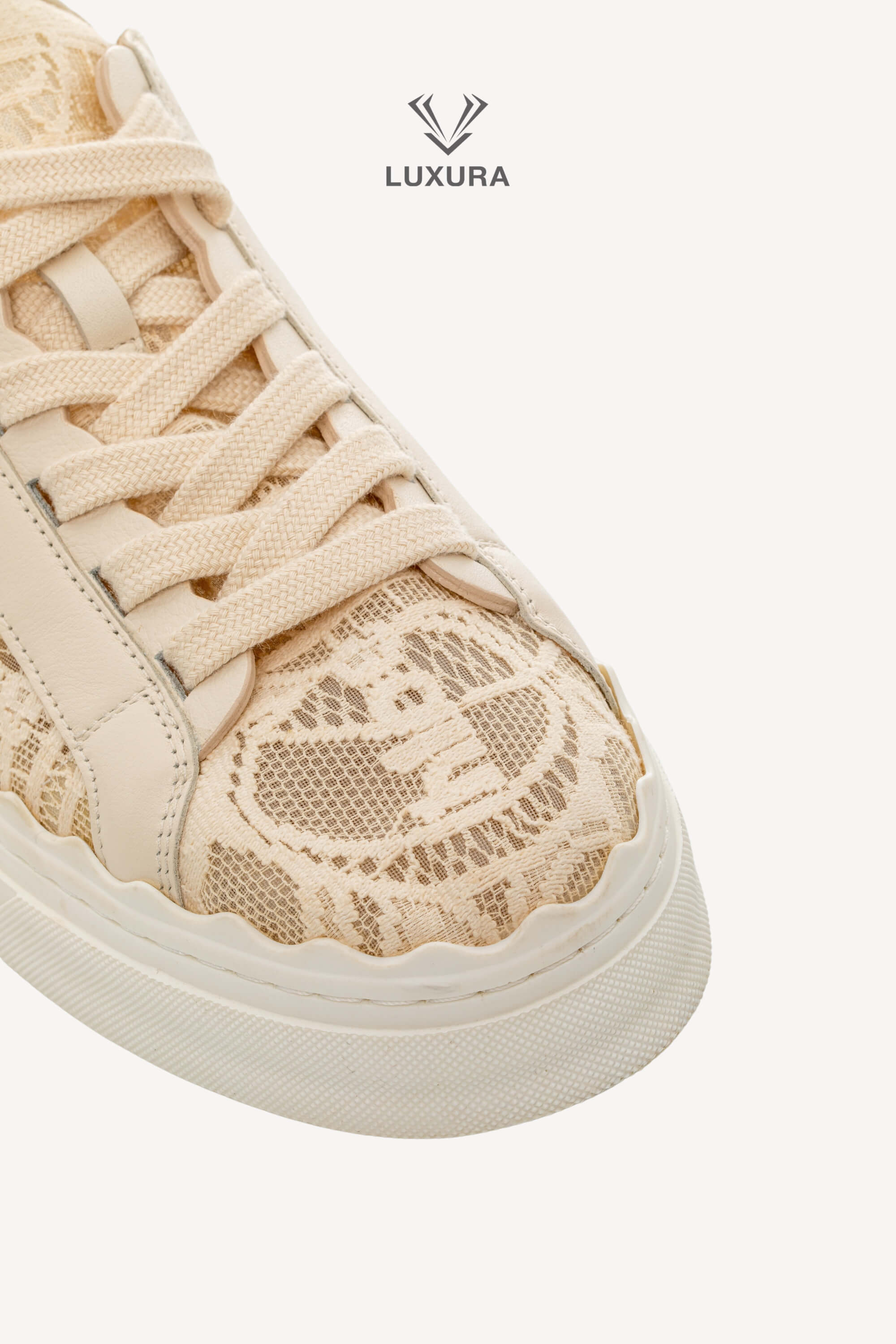 <span style="font-size: 10px;letter-spacing: .15em">IN TRENDING</span><br> <strong>CHLOE</strong><br> <div style="margin-top:10px;font-size:16px">Lauren Lace Sneakers in Beige 38</div><br> - Image 10