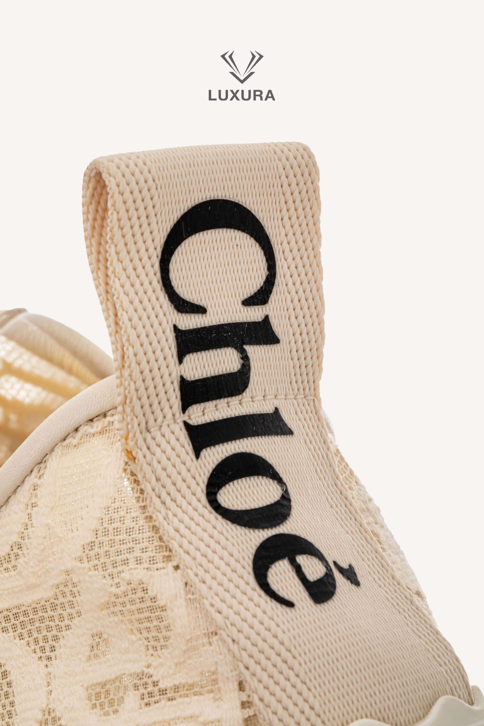 <span style="font-size: 10px;letter-spacing: .15em">IN TRENDING</span><br> <strong>CHLOE</strong><br> <div style="margin-top:10px;font-size:16px">Lauren Lace Sneakers in Beige 38</div><br> - Image 14