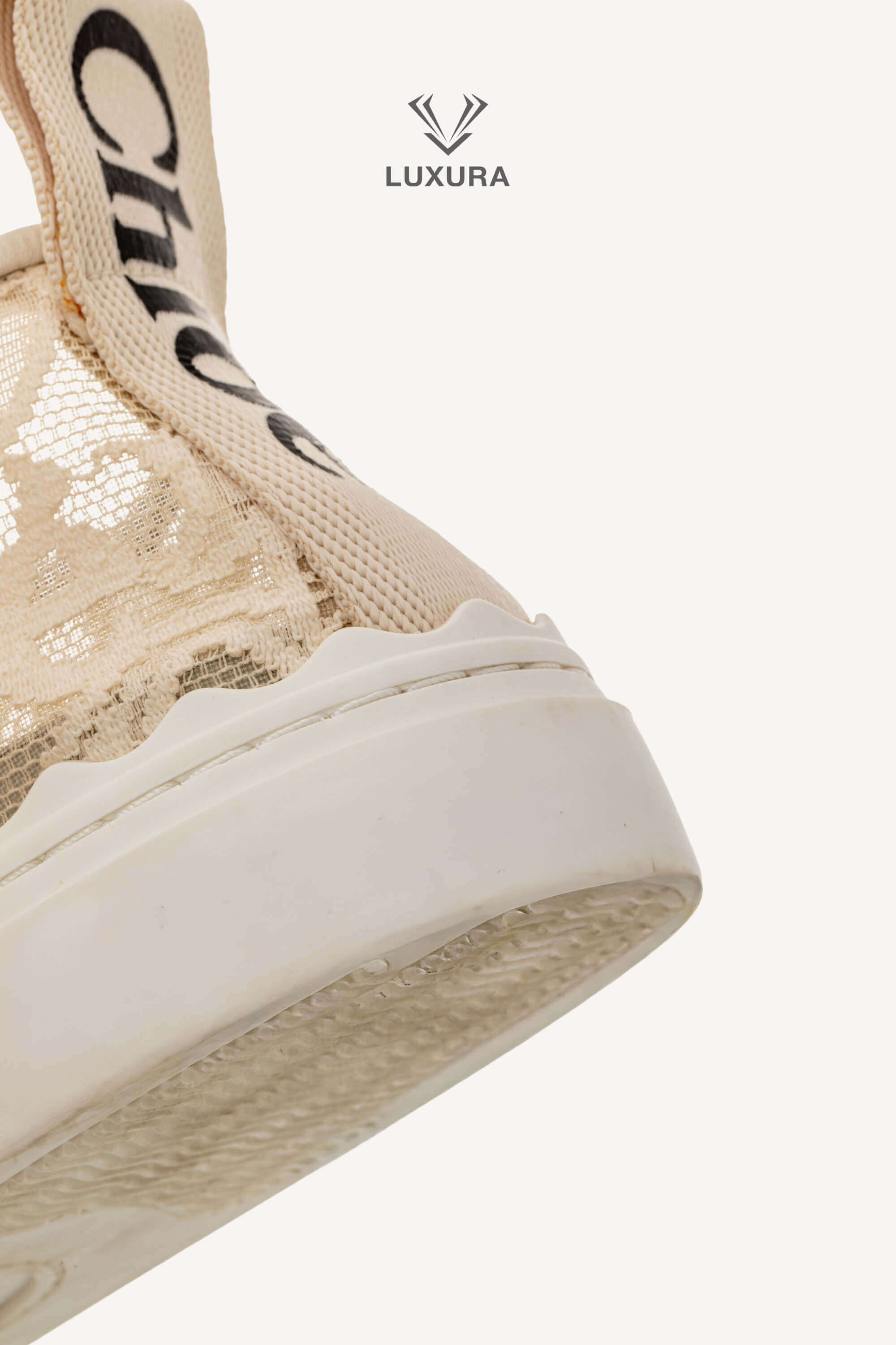 <span style="font-size: 10px;letter-spacing: .15em">IN TRENDING</span><br> <strong>CHLOE</strong><br> <div style="margin-top:10px;font-size:16px">Lauren Lace Sneakers in Beige 38</div><br> - Image 17