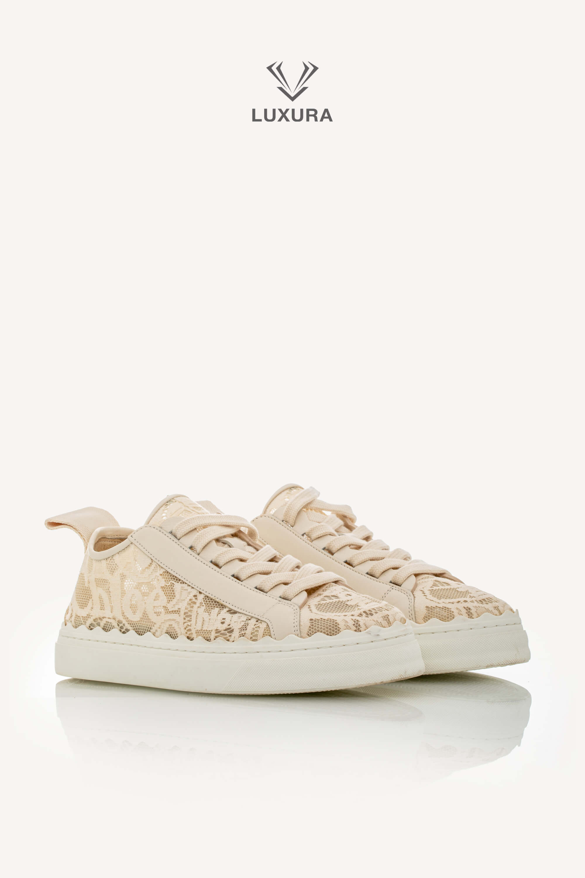 <span style="font-size: 10px;letter-spacing: .15em">IN TRENDING</span><br> <strong>CHLOE</strong><br> <div style="margin-top:10px;font-size:16px">Lauren Lace Sneakers in Beige 38</div><br> - Image 3