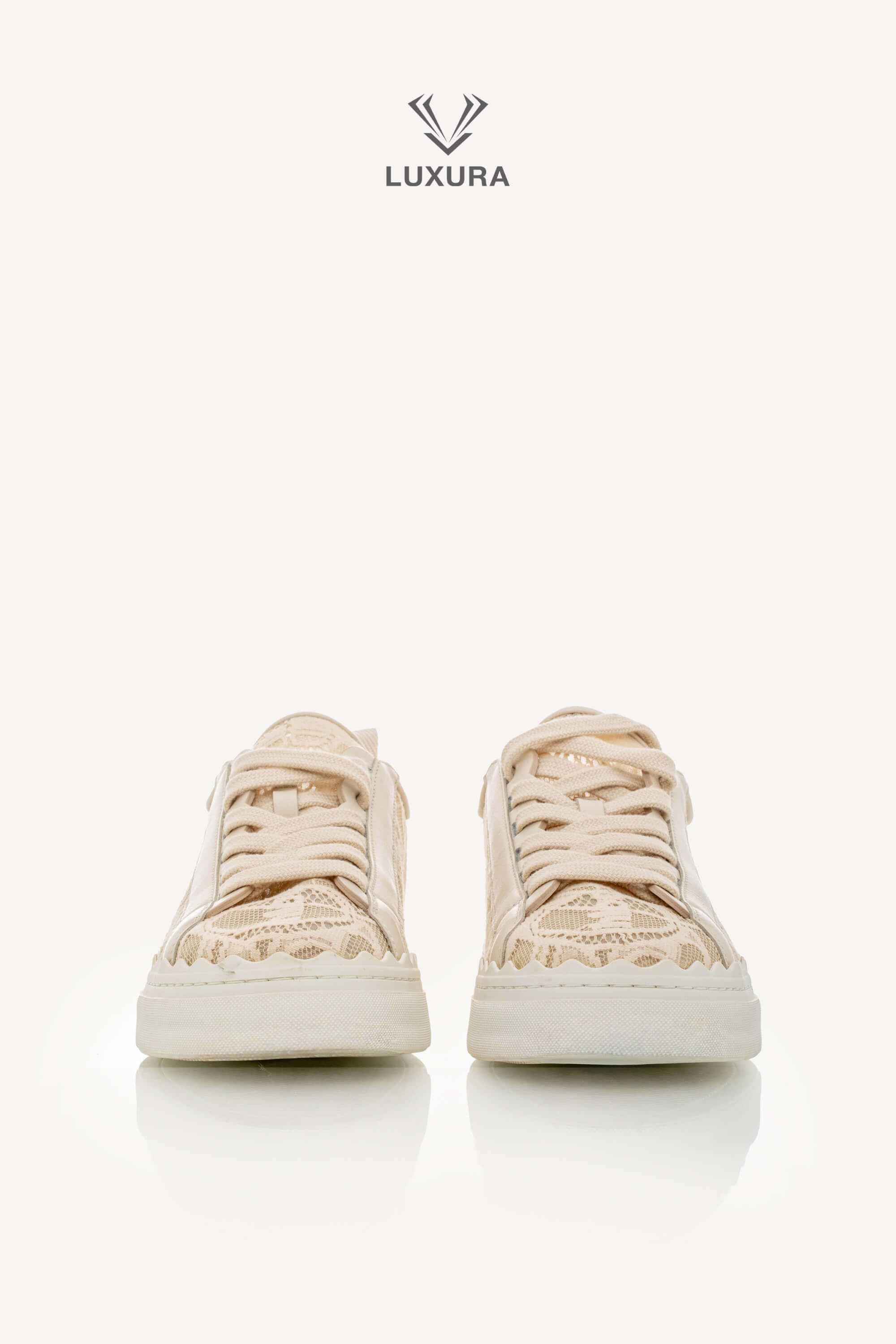 <span style="font-size: 10px;letter-spacing: .15em">IN TRENDING</span><br> <strong>CHLOE</strong><br> <div style="margin-top:10px;font-size:16px">Lauren Lace Sneakers in Beige 38</div><br> - Image 4