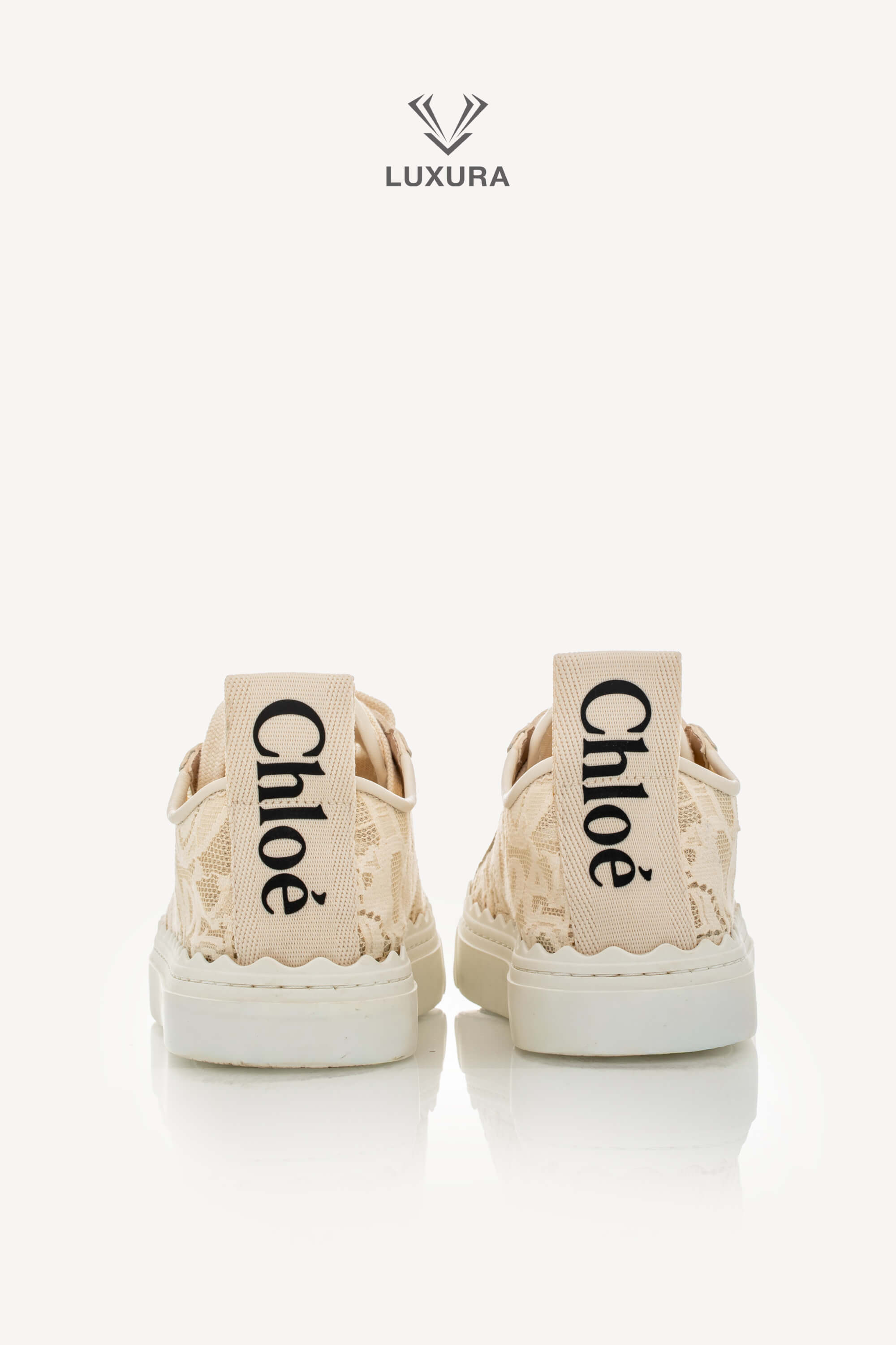 <span style="font-size: 10px;letter-spacing: .15em">IN TRENDING</span><br> <strong>CHLOE</strong><br> <div style="margin-top:10px;font-size:16px">Lauren Lace Sneakers in Beige 38</div><br> - Image 5