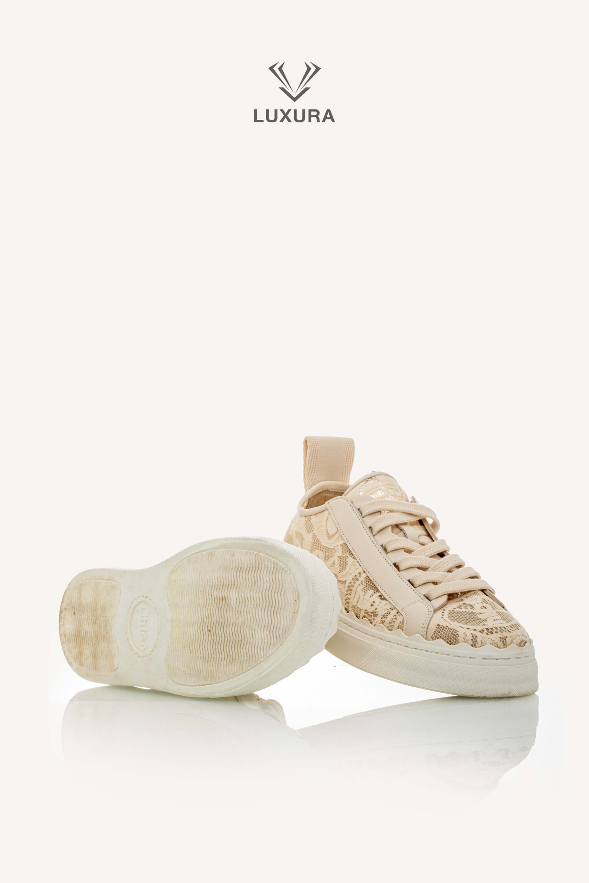 <span style="font-size: 10px;letter-spacing: .15em">IN TRENDING</span><br> <strong>CHLOE</strong><br> <div style="margin-top:10px;font-size:16px">Lauren Lace Sneakers in Beige 38</div><br> - Image 19