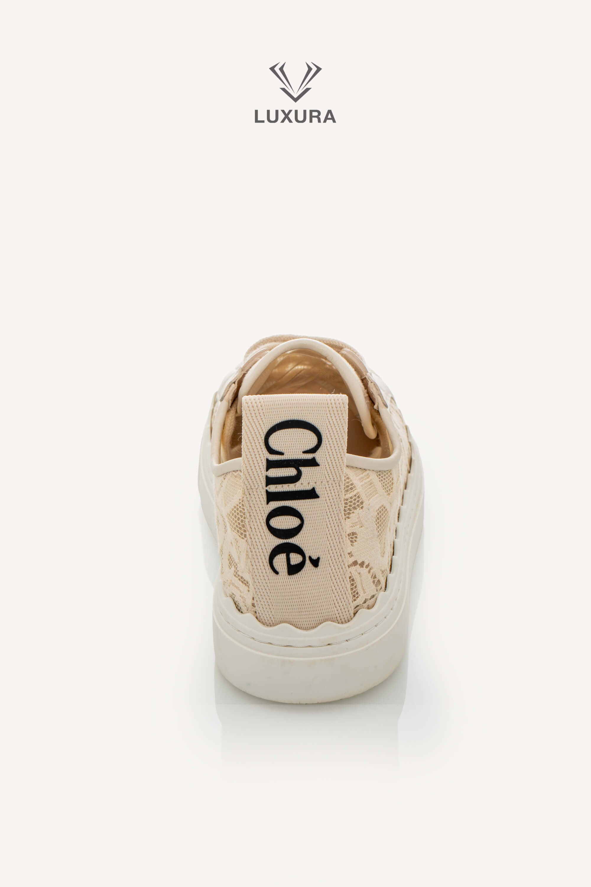 <span style="font-size: 10px;letter-spacing: .15em">IN TRENDING</span><br> <strong>CHLOE</strong><br> <div style="margin-top:10px;font-size:16px">Lauren Lace Sneakers in Beige 38</div><br> - Image 7